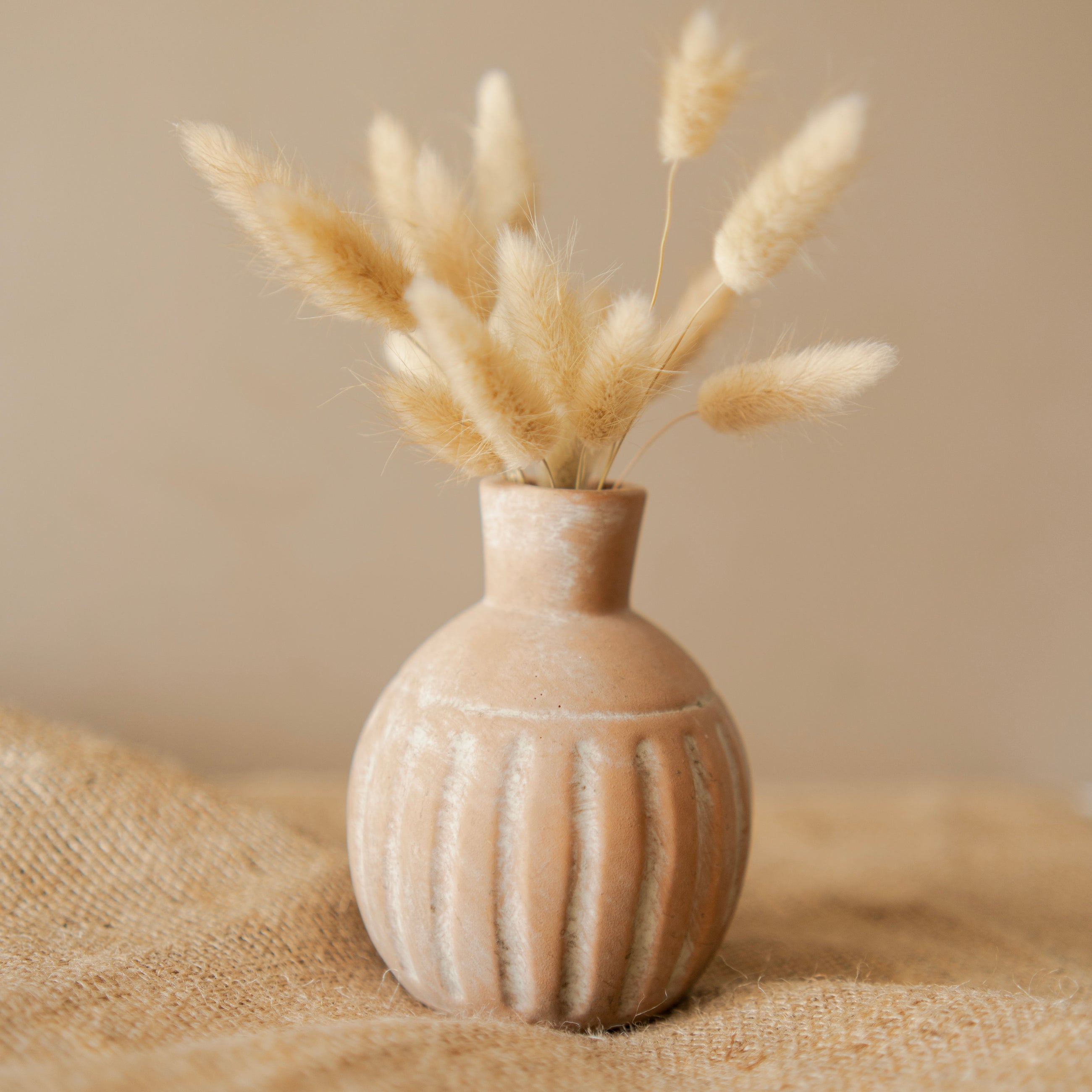 Rustic vase with bunny tails