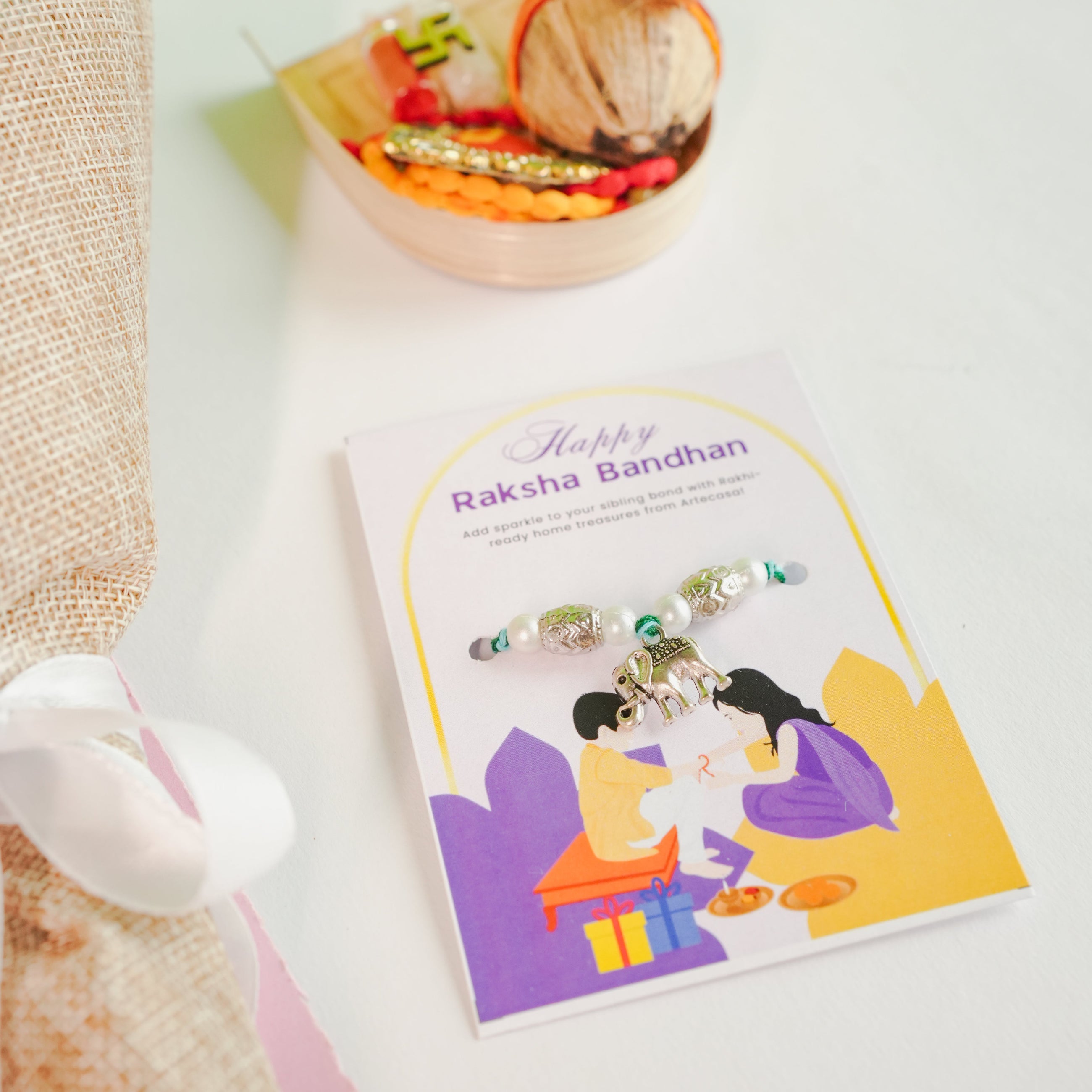 Handcrafted crochet lily Rakhi hamper (White)