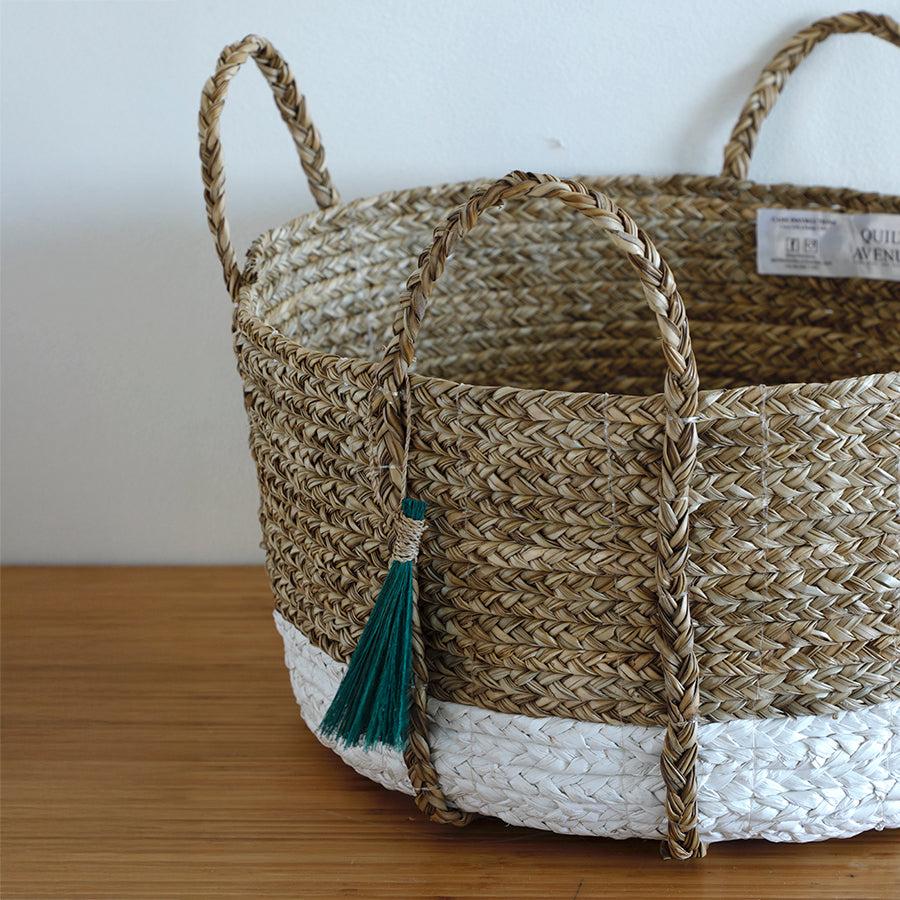 Anthro tassel basket green