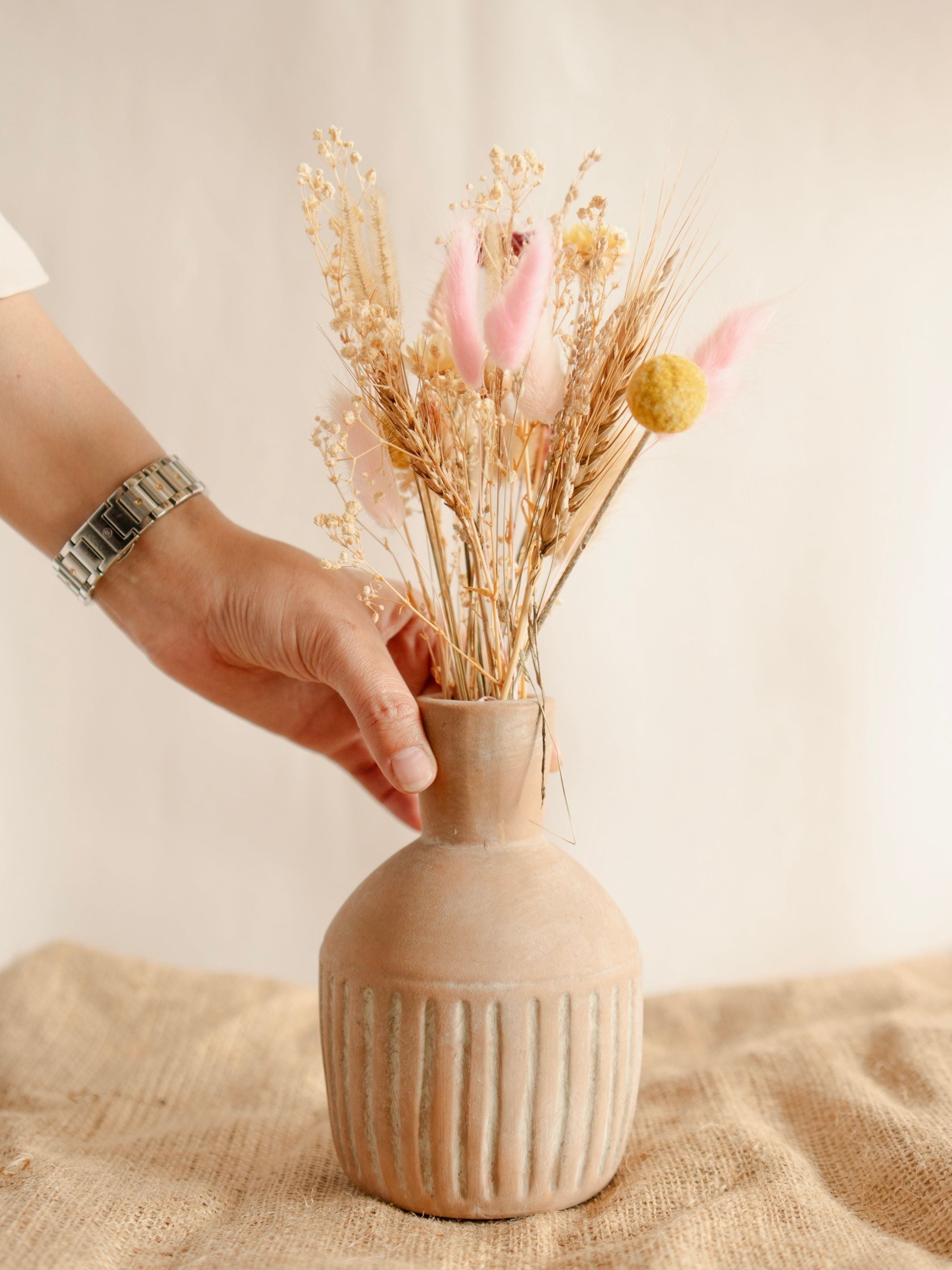 Earth's Embrace vase with bunch