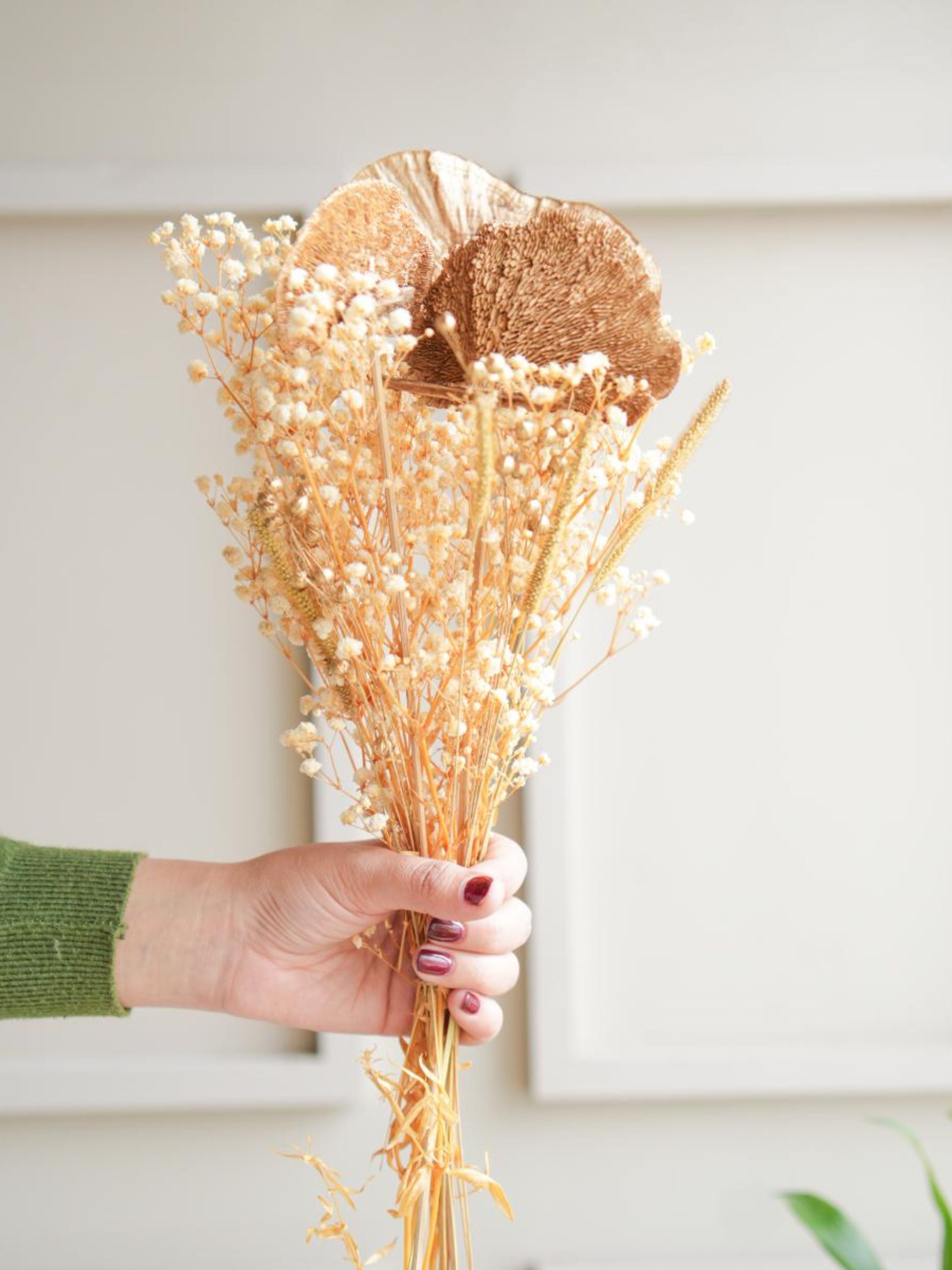 Golden harvest bunch with snow white vase