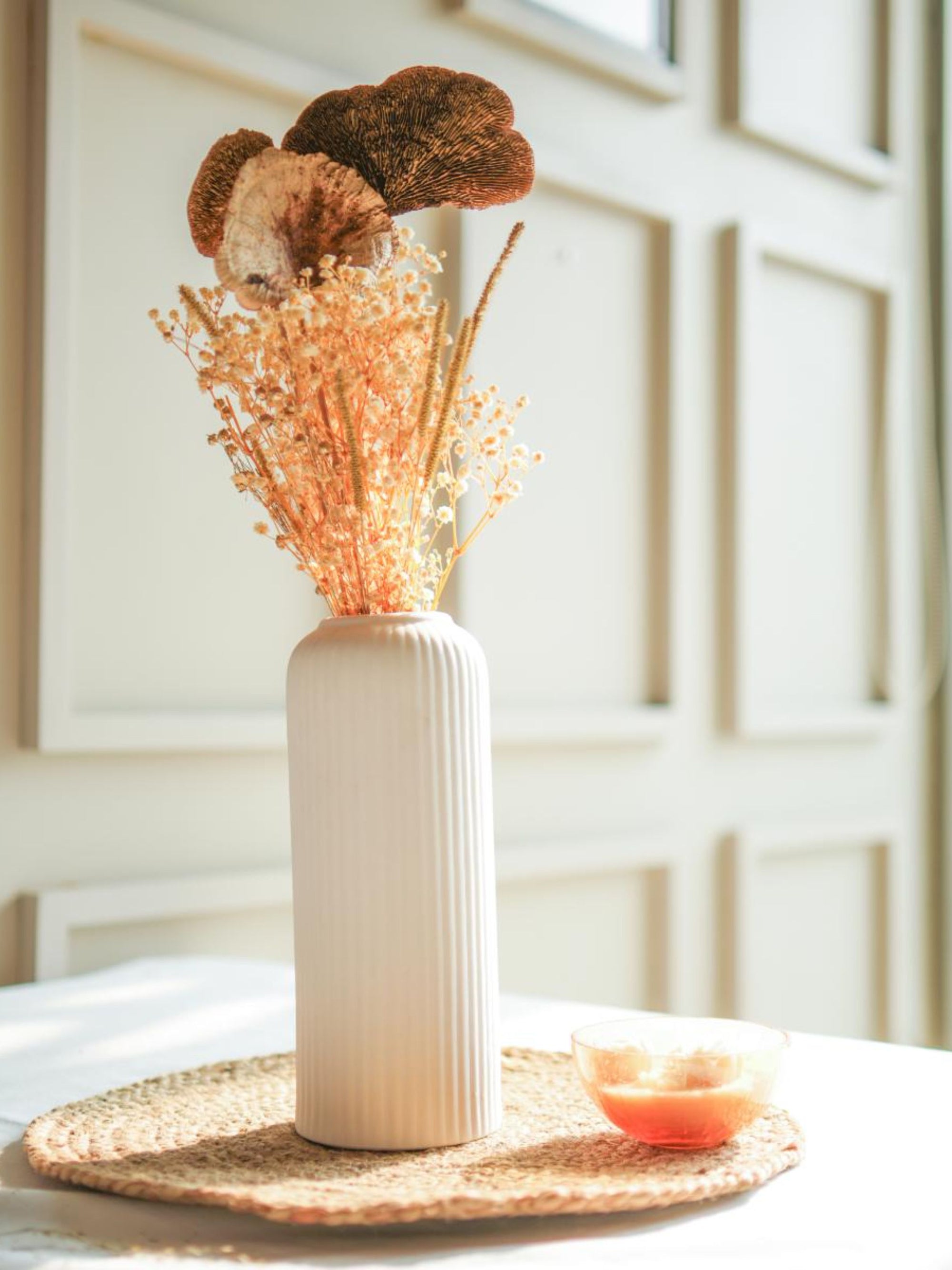 Golden harvest bunch with snow white vase