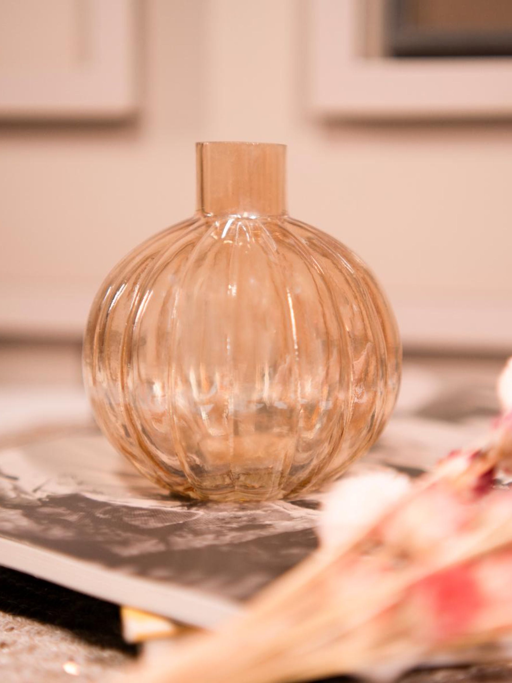 Pumpkin vase with dried flower bunch