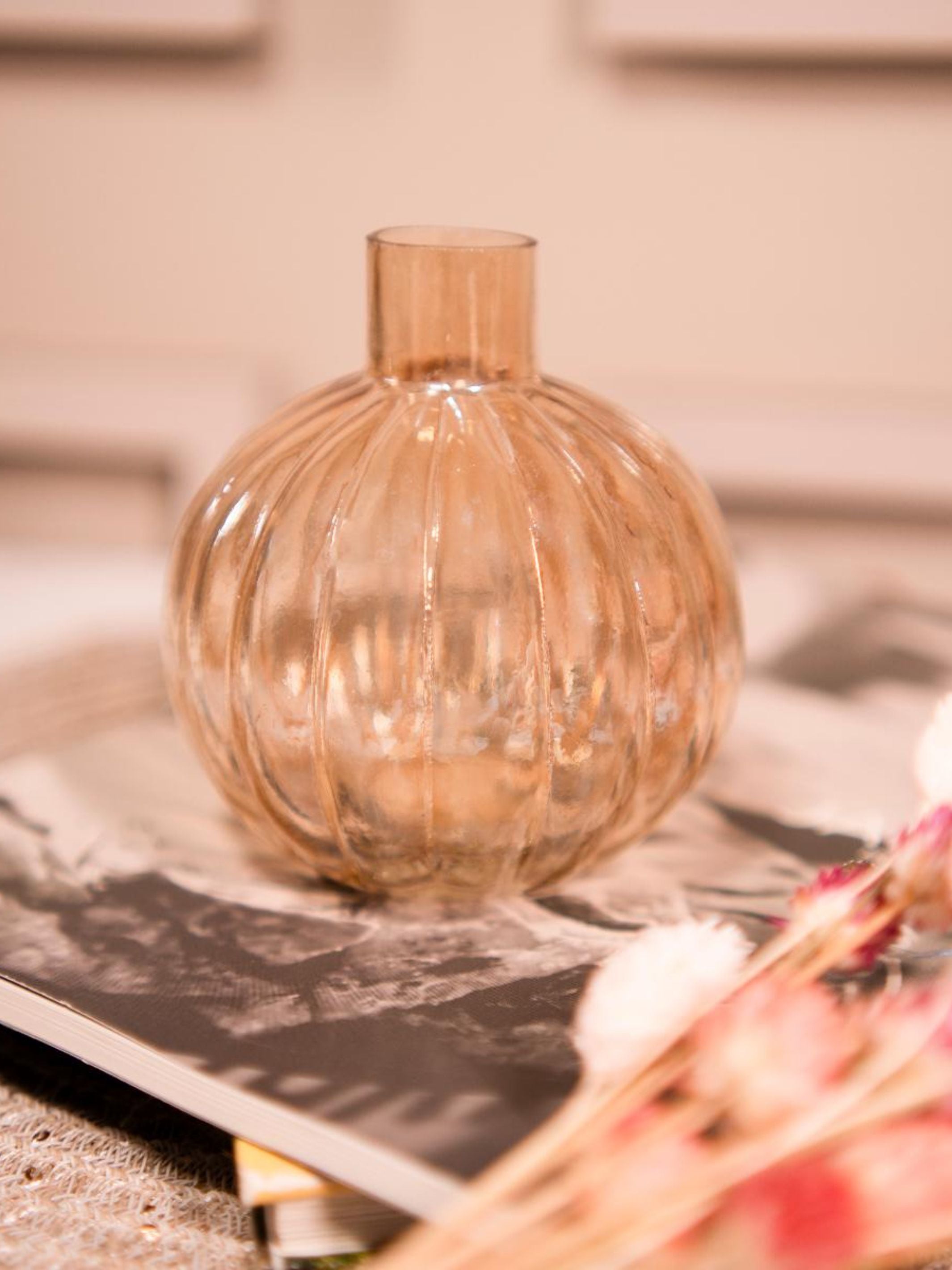 Pumpkin vase with dried flower bunch