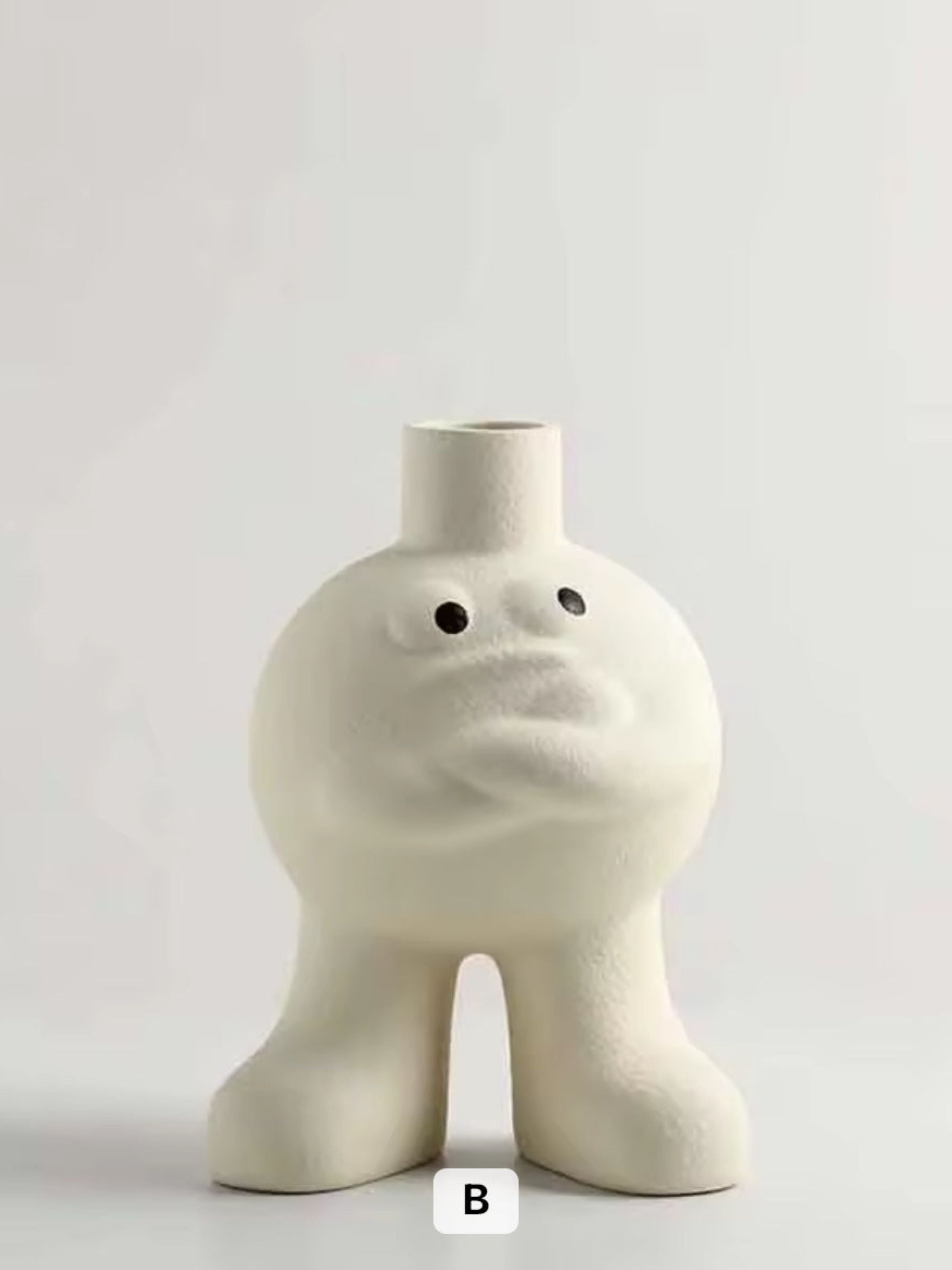 Big feet Flower vase hugging chest