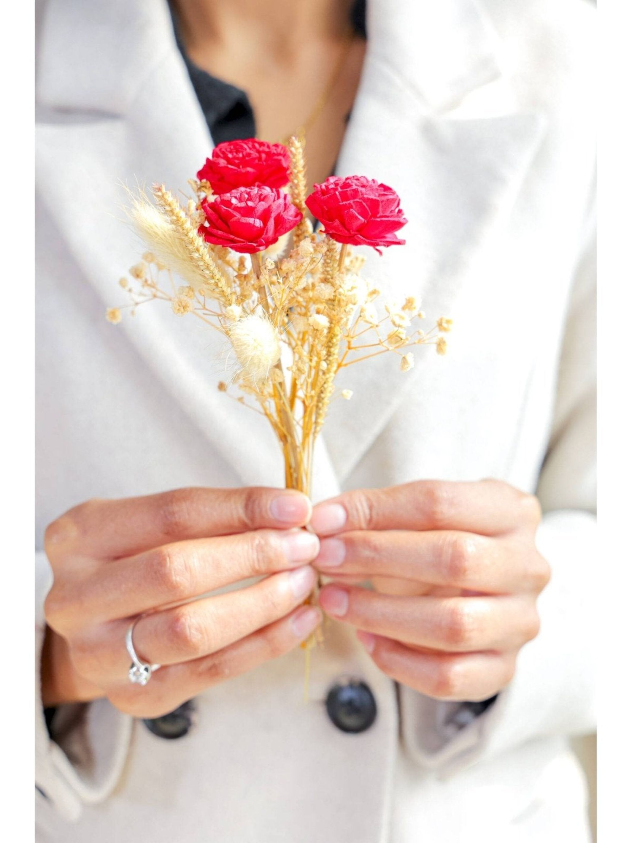 Mini glass bottle vase with red velvet bunch