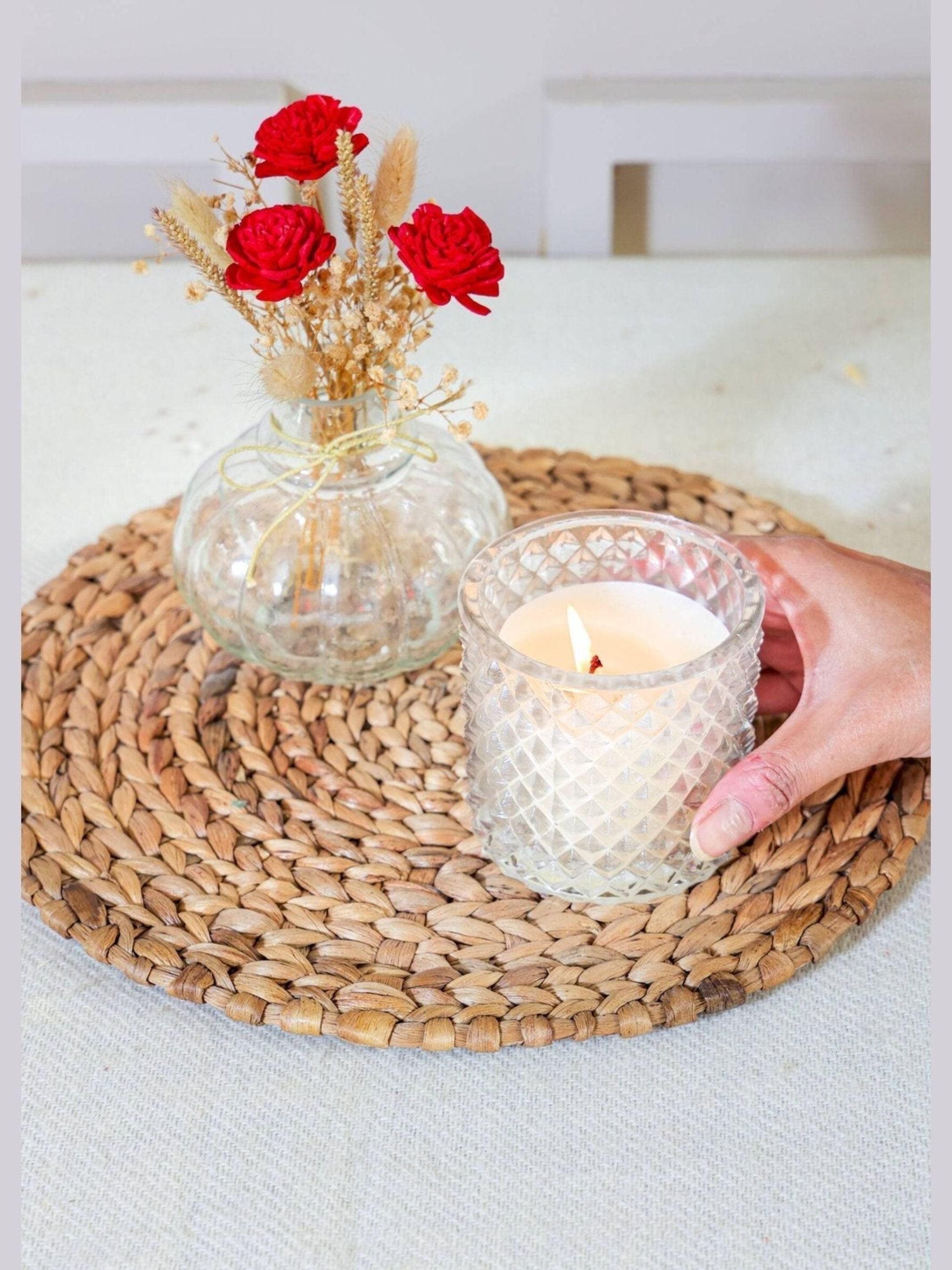 Mini glass bottle vase with red velvet bunch