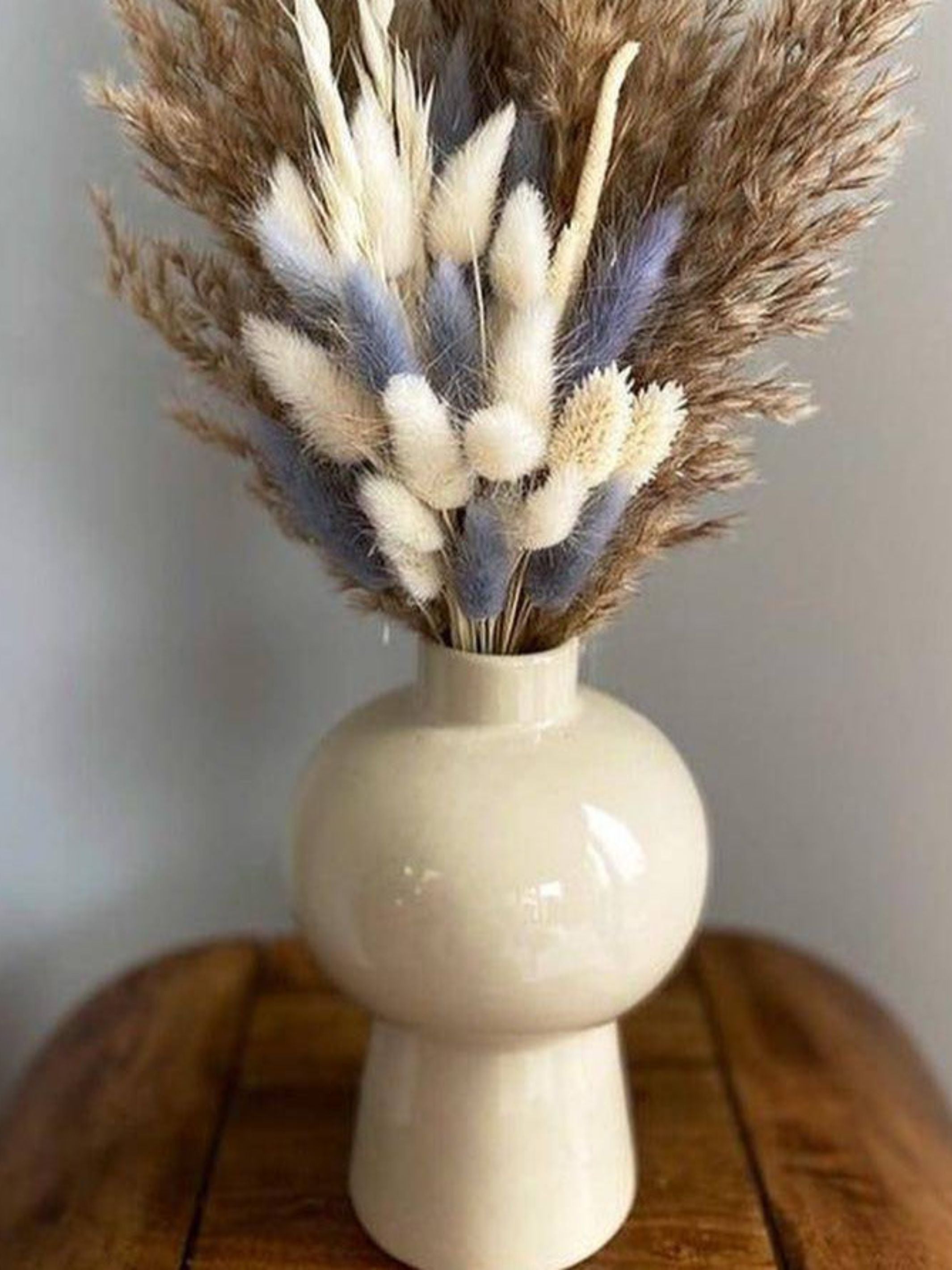 Mushroom vase with lilac bunch