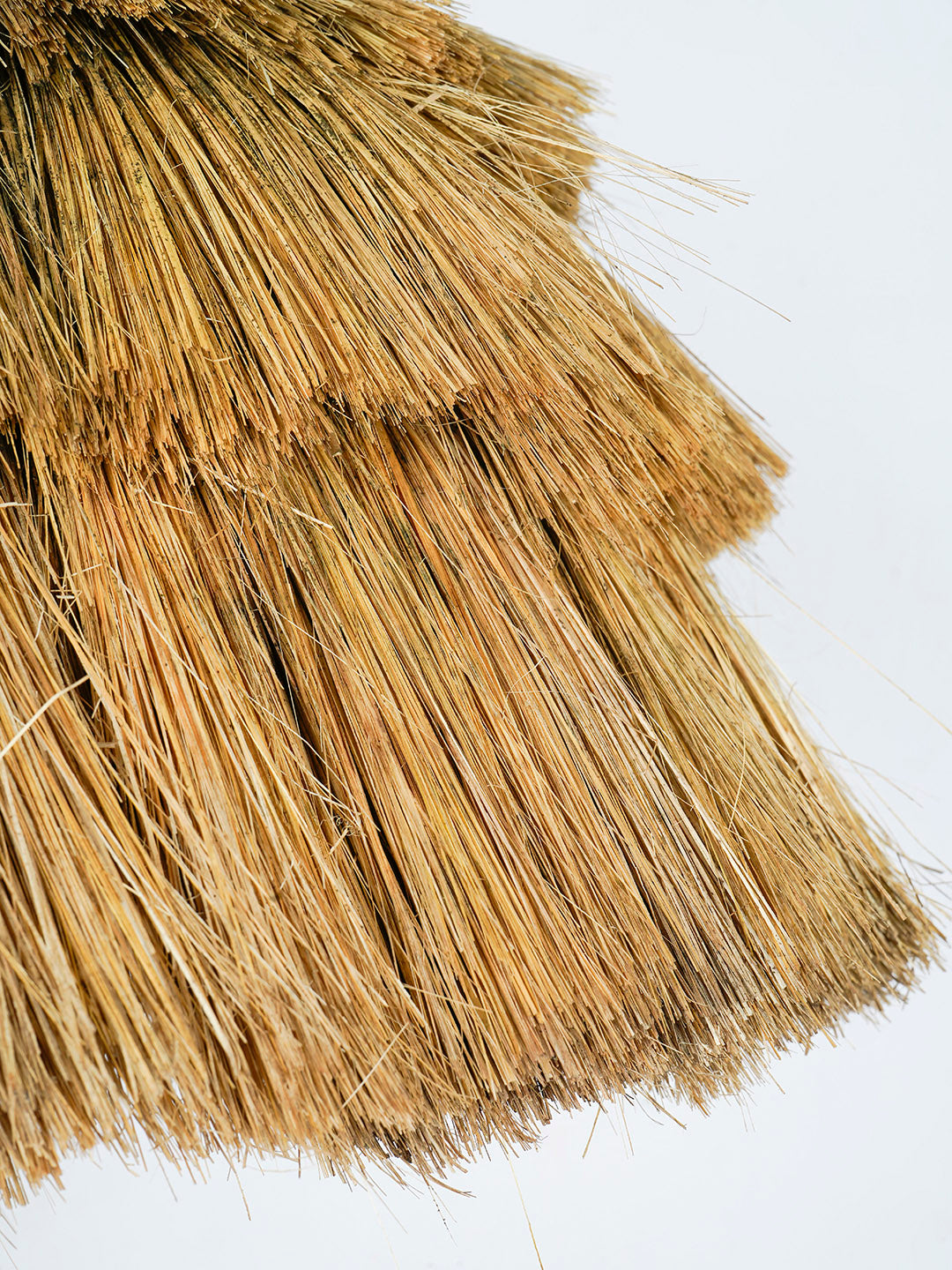 Bohemian Glow: Fringed Munja Hay Pendant Light Adds Rustic Charm & Modern Flair