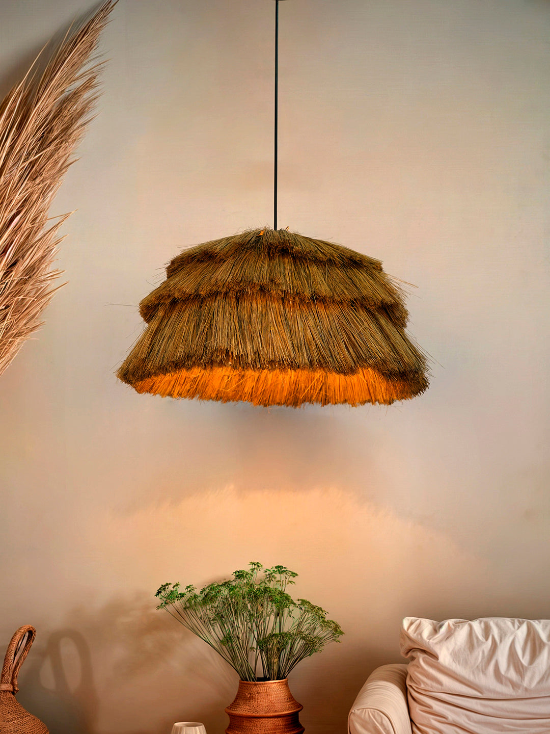 Bohemian Glow: Fringed Munja Hay Pendant Light Adds Rustic Charm & Modern Flair