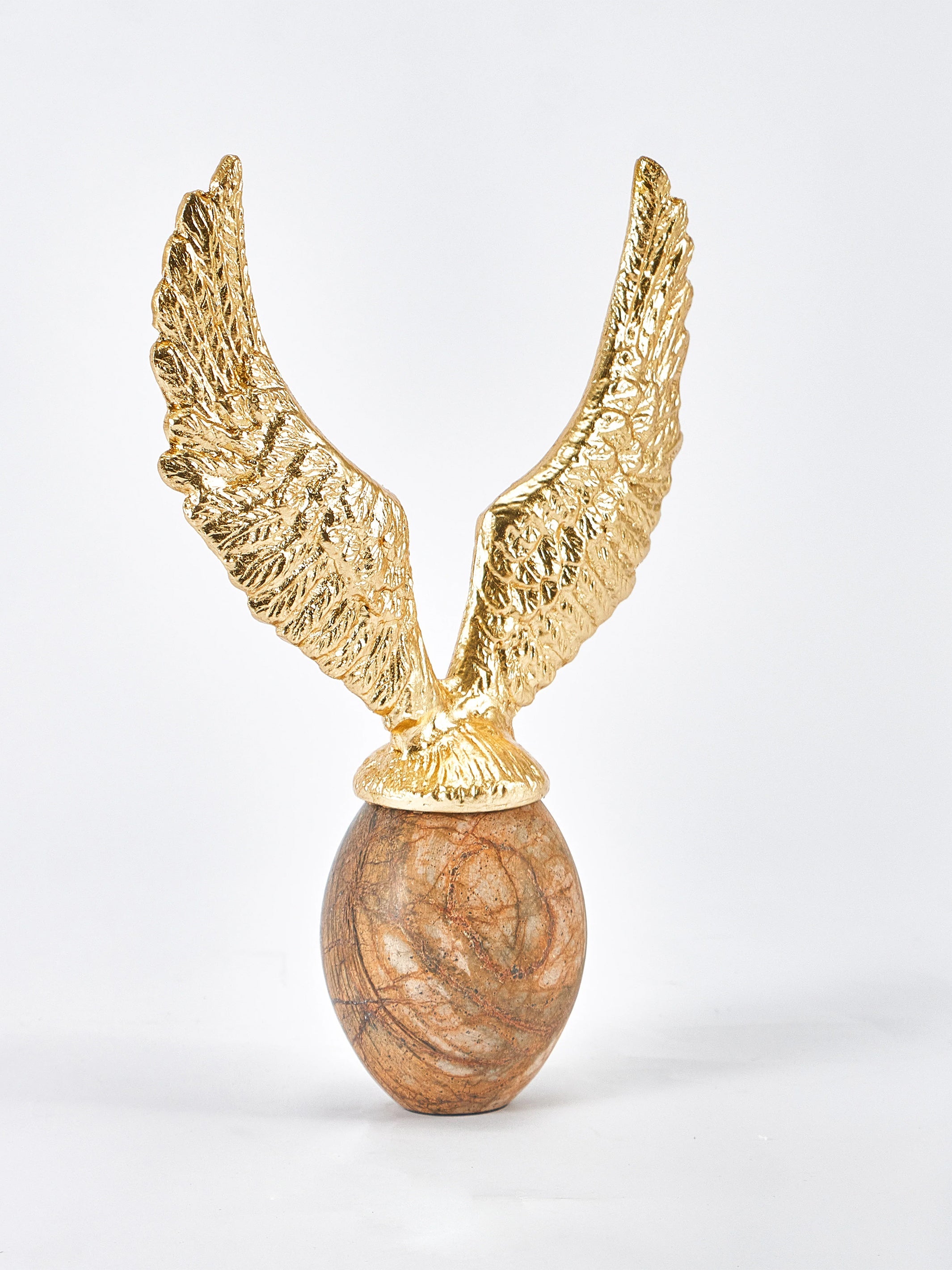 Golden Fyling Egg Sculpture