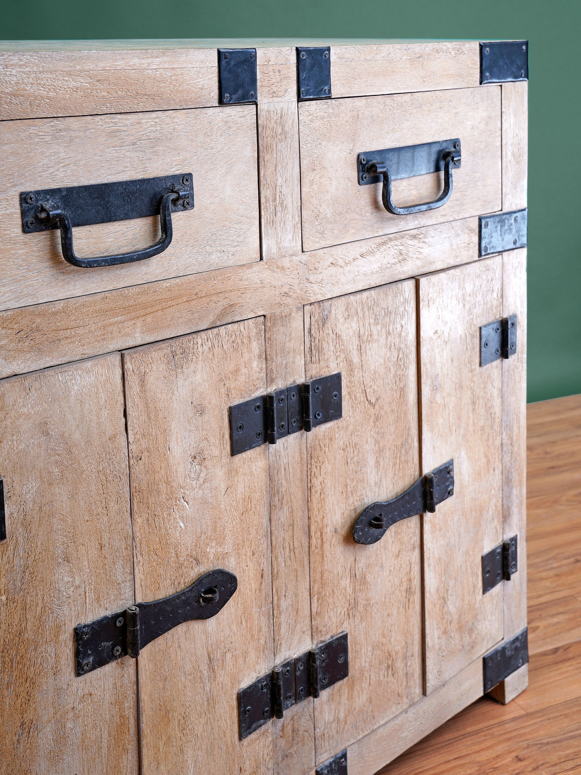 Dramatic Metal Braces Cabinet