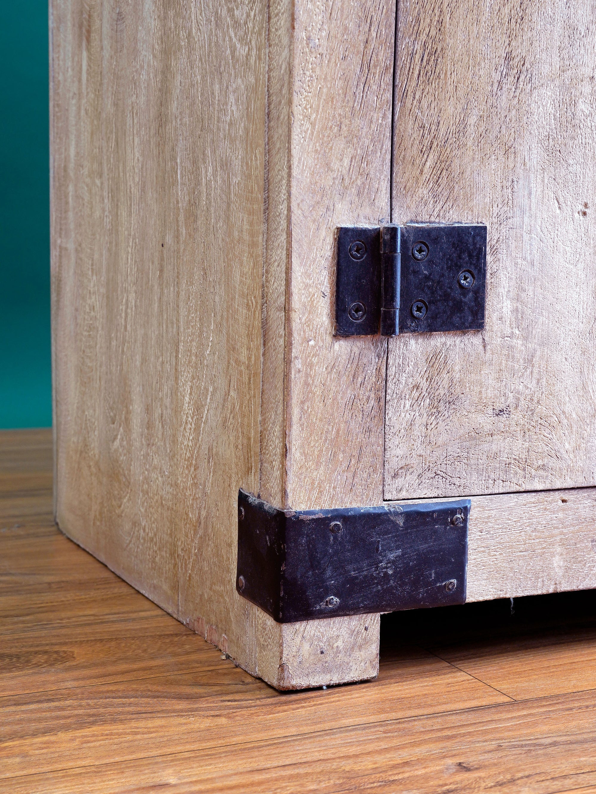 Dramatic Metal Braces Cabinet