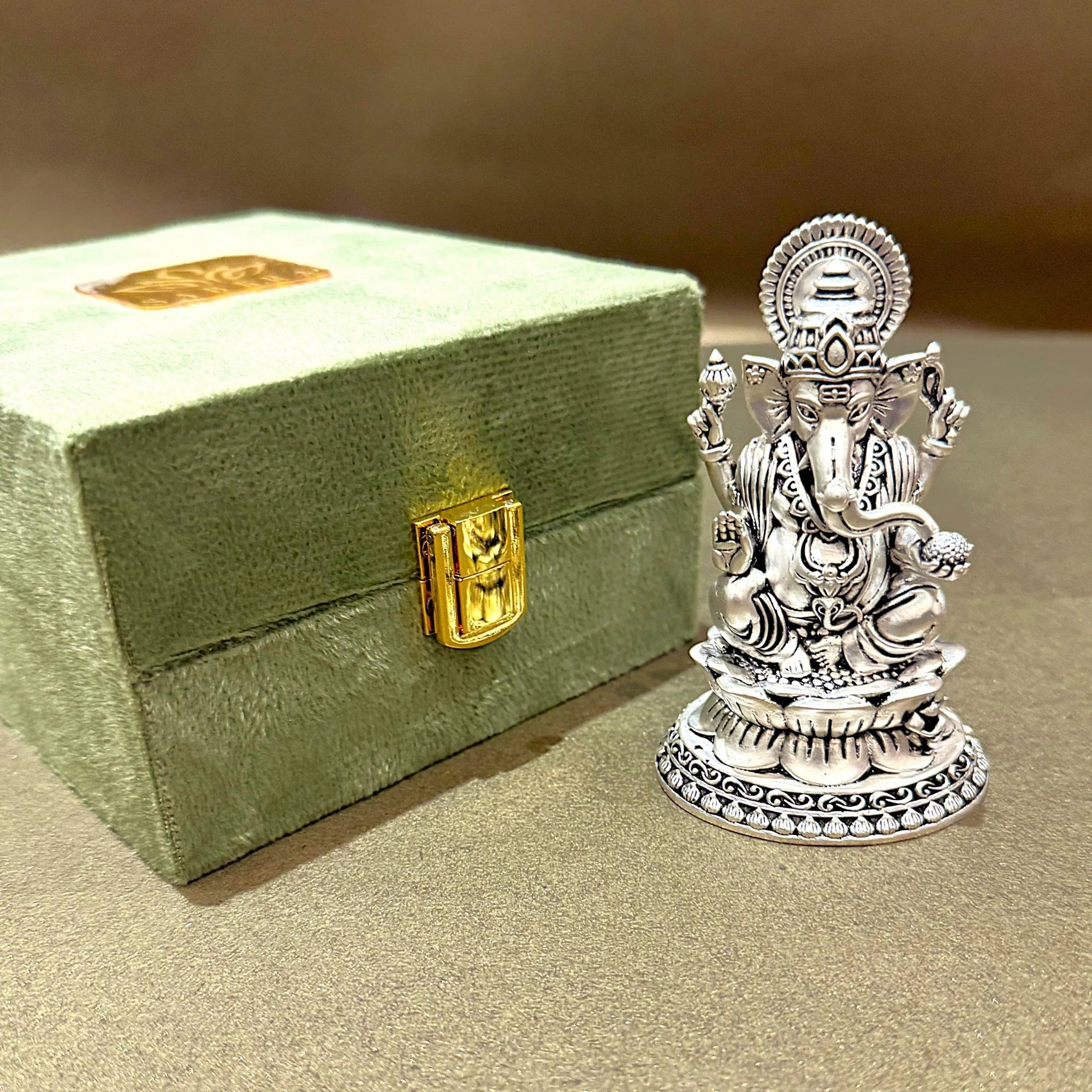 Silver Lord Ganesha idol with decorative green gift box, Sabera home decor