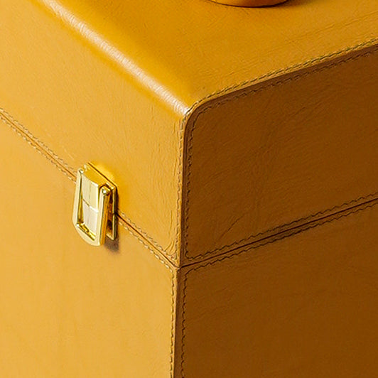 Yellow leather bar cabinet displayed in home interior - The Mage Home