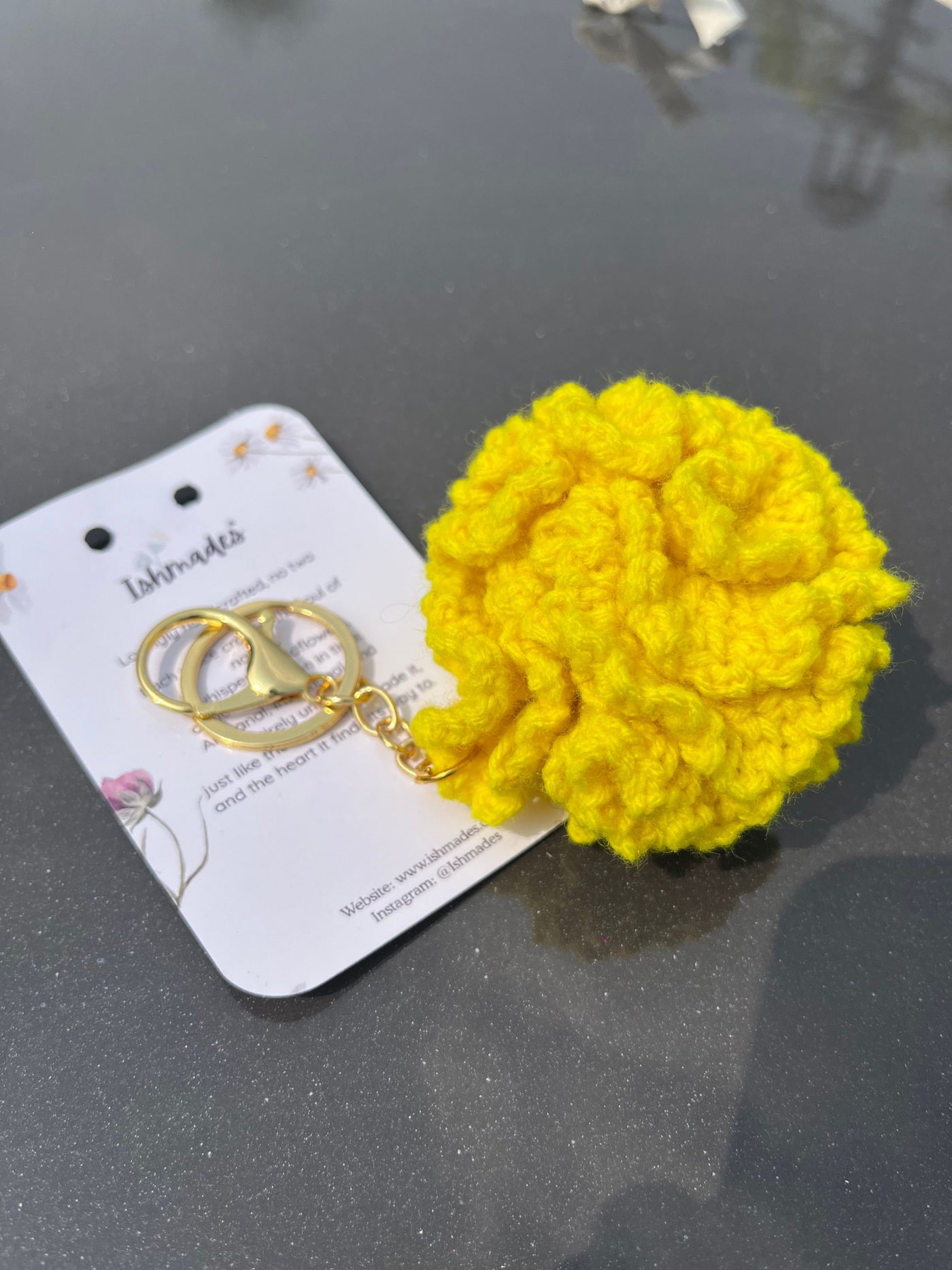 Crochet marigold keychain