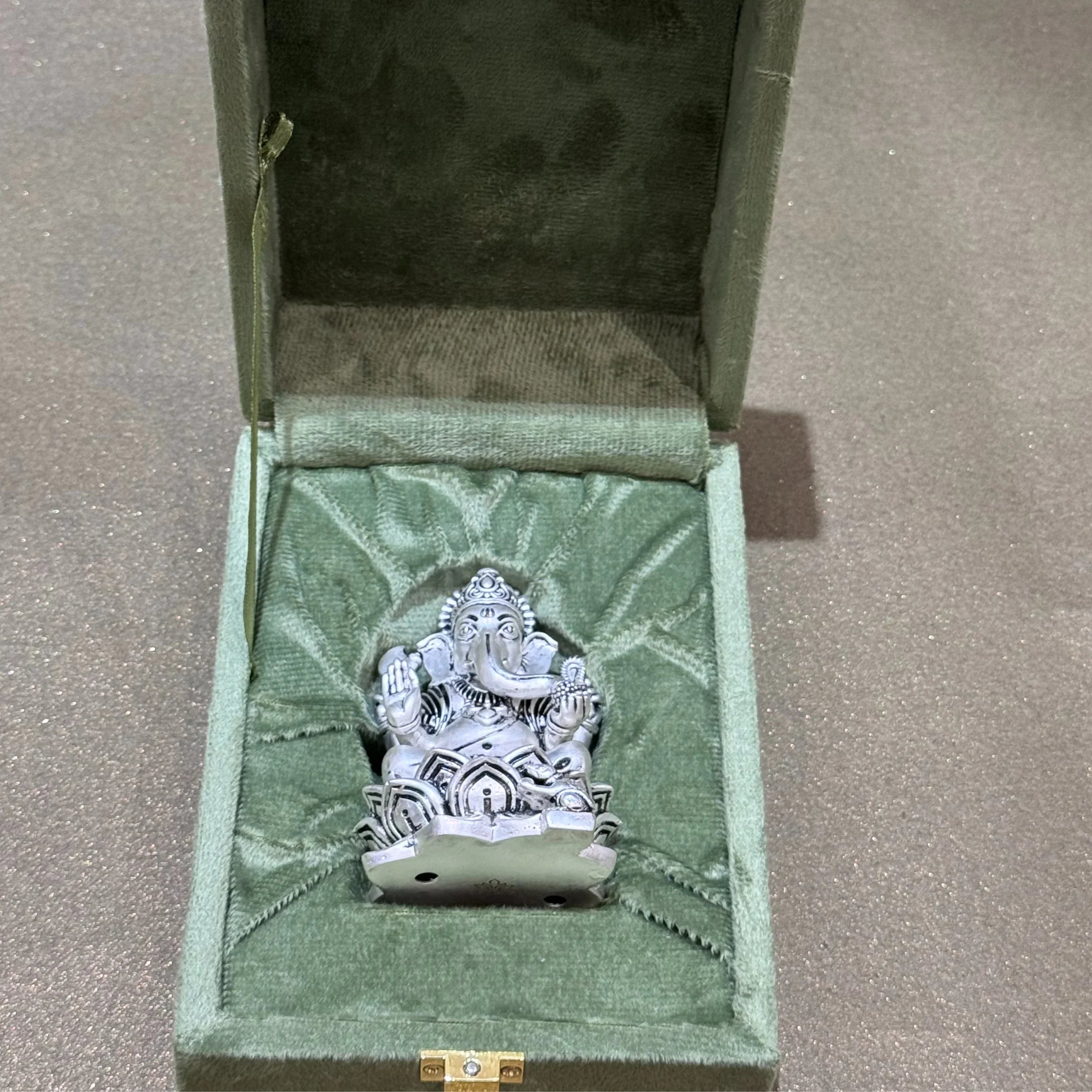 Silver Ganesh idol in green velvet box, Sabera home decor.