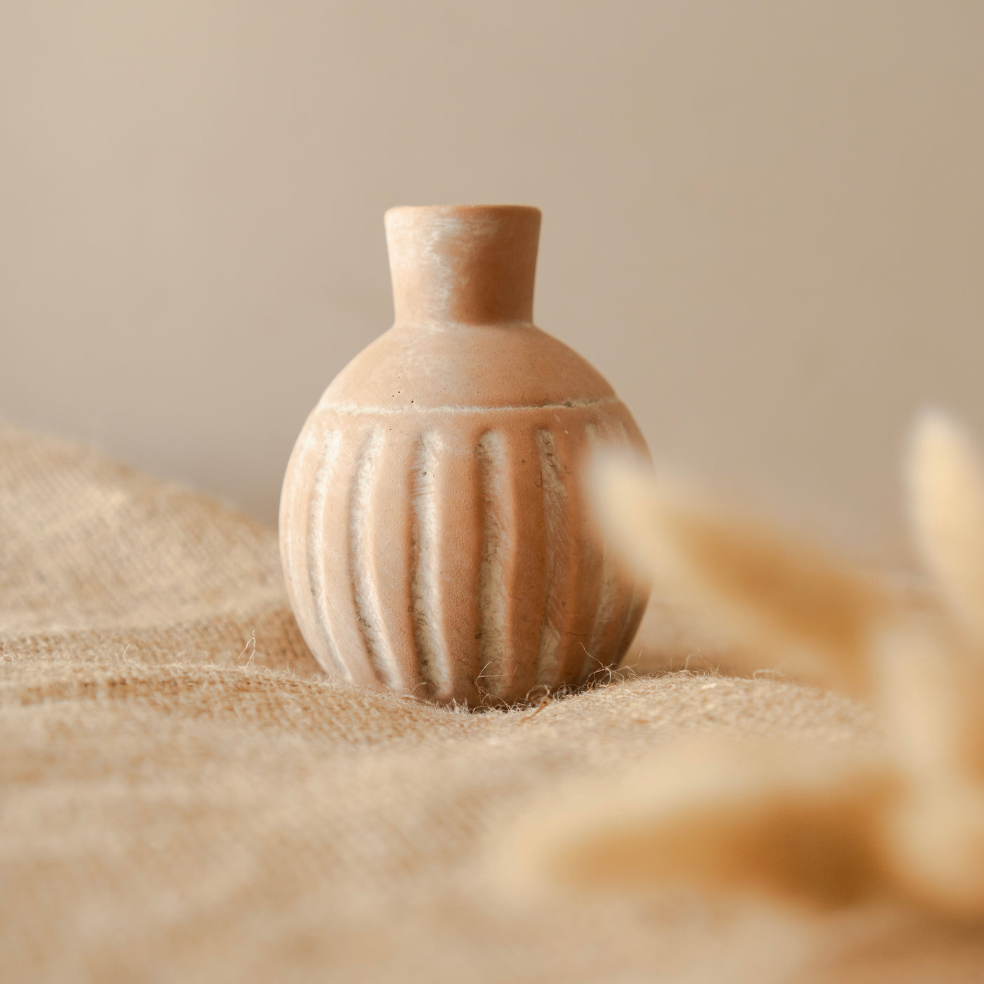 Rustic vase with bunny tails