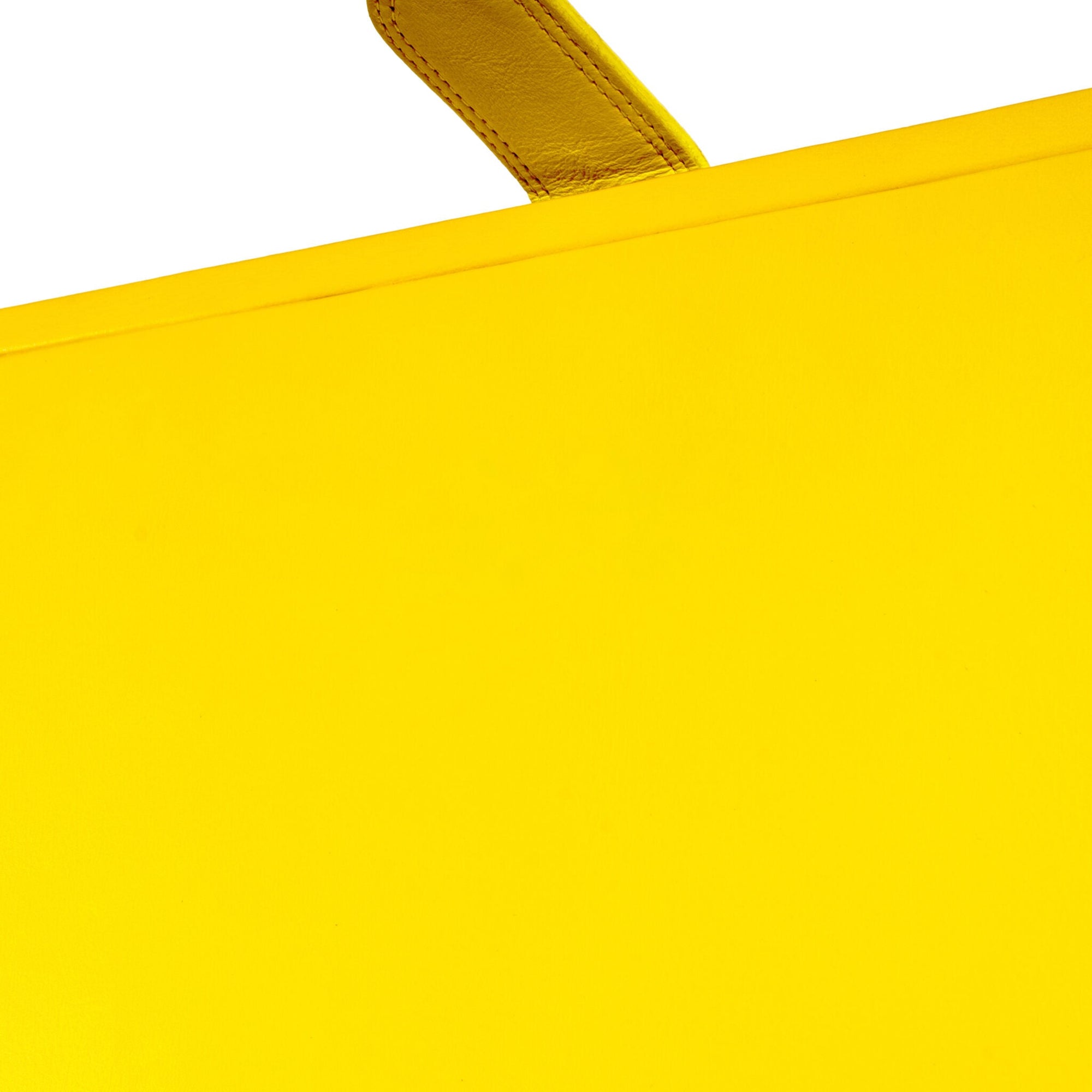 Bold yellow leather desk box displayed on workspace - The Mage Home
