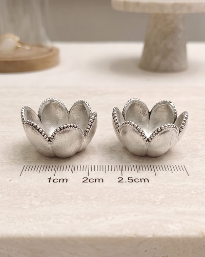 Two Kamal Katori lotus bowls in pure silver plating beside a ruler showing 2.5 cm width