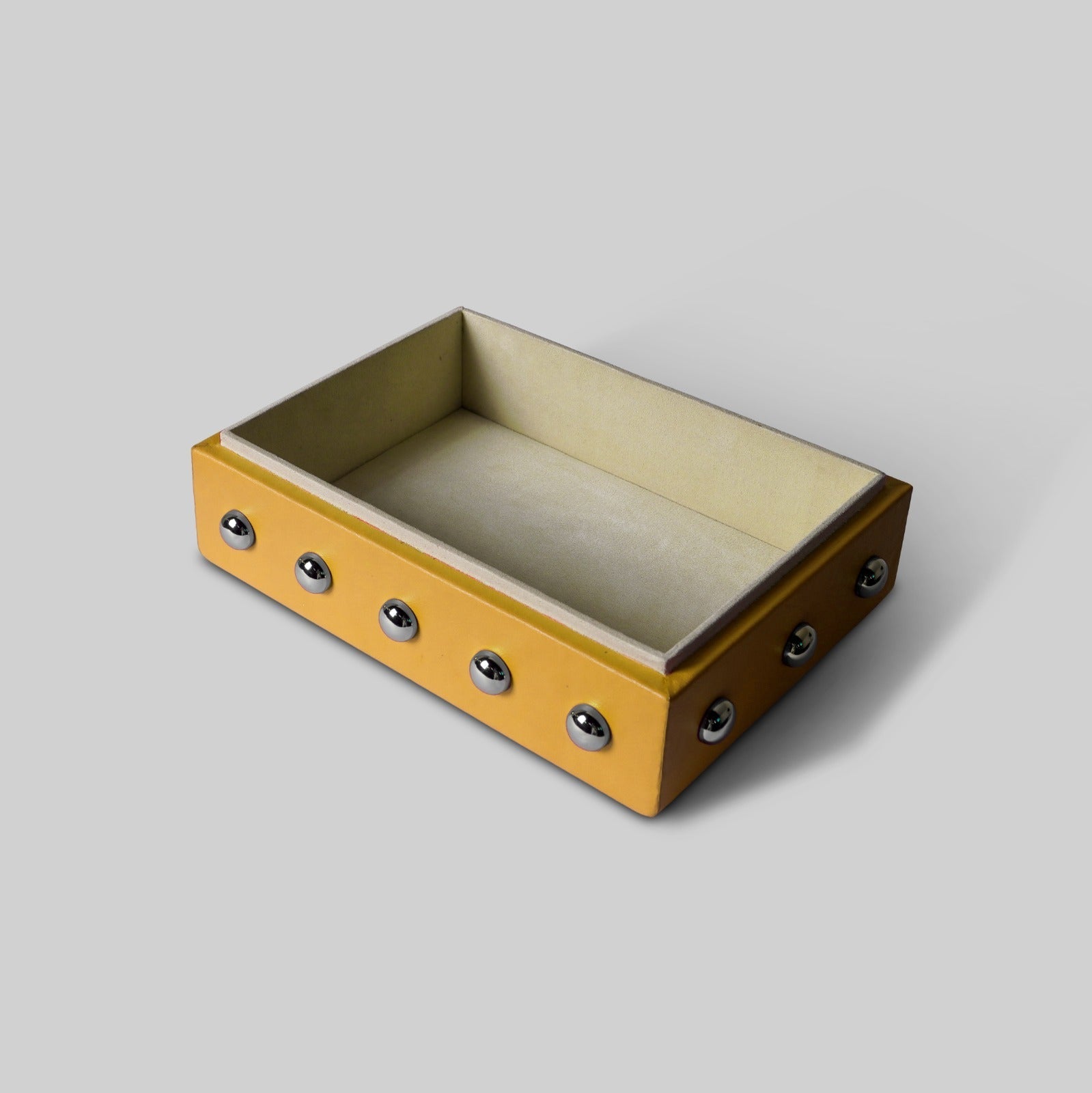 Luxury yellow leather zest box displayed on desk - The Mage Home