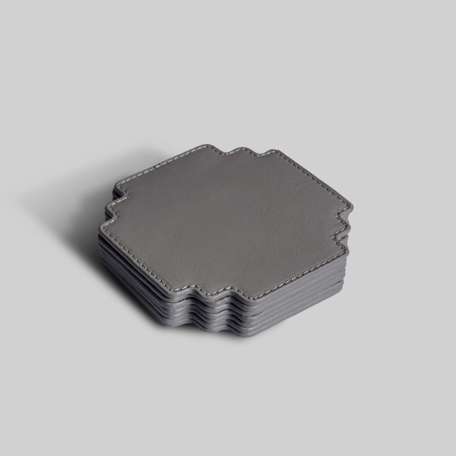 Grey gaming coasters close up detail leather India - The Mage Home