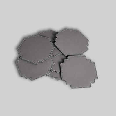 Grey leather gaming coasters stacked view India - The Mage Home