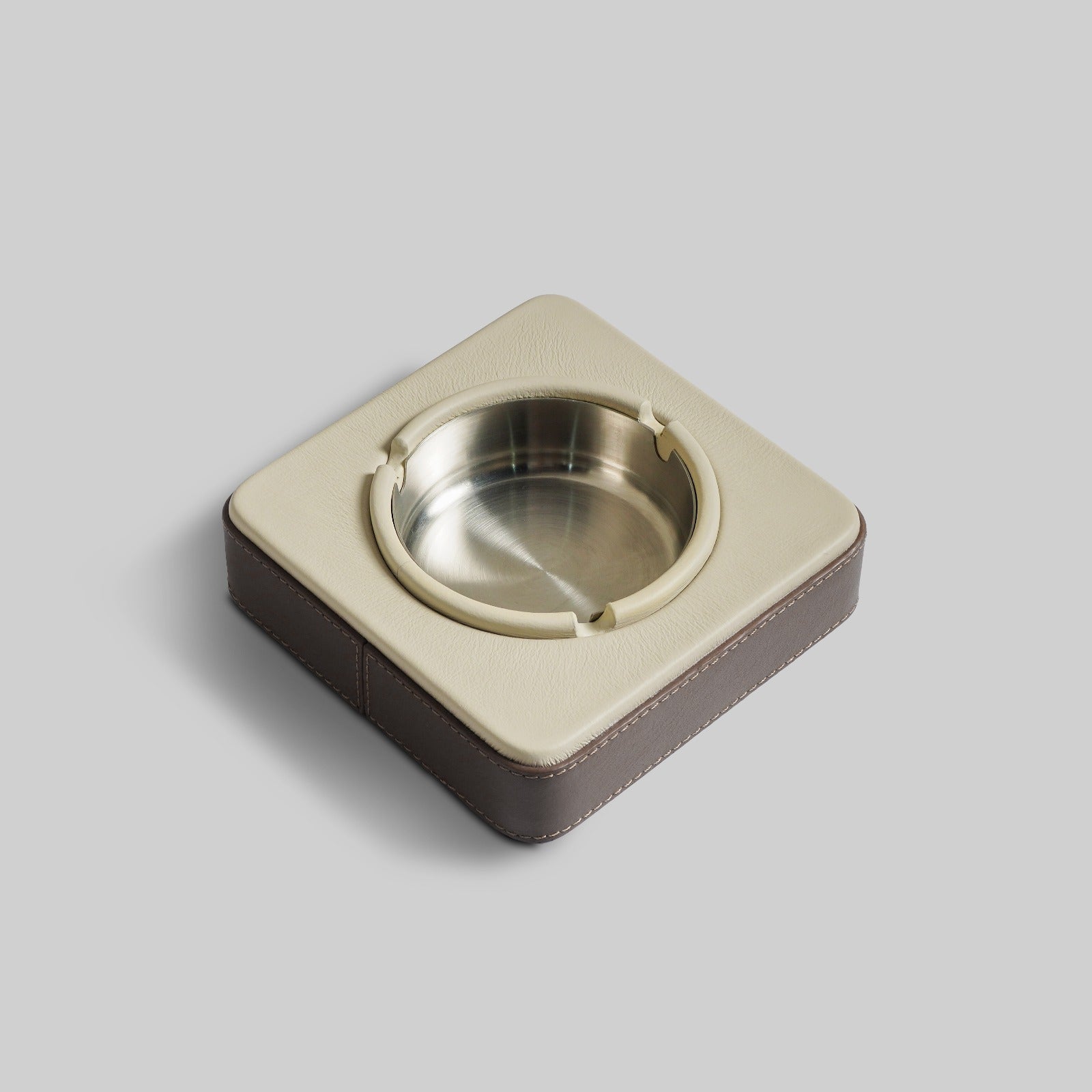 Grey leather ashtray displayed on desk India - The Mage Home