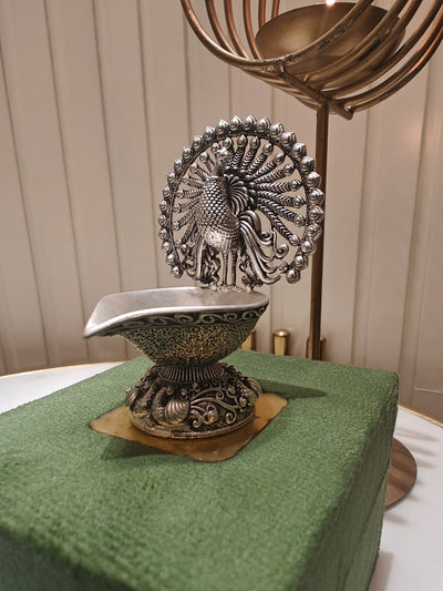 Elegant Silver Peacock Diya – Handcrafted Decorative Oil Lamp