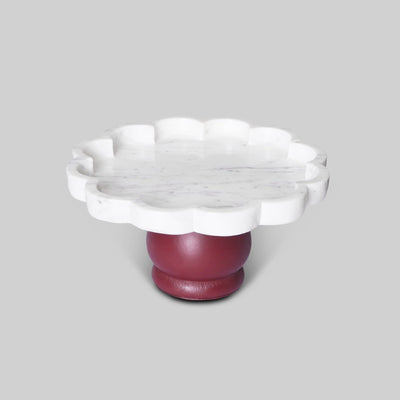 Leather cake stand with cake displayed on dining table India - The Mage Home