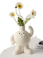 Big feet Flower vase scratching the head