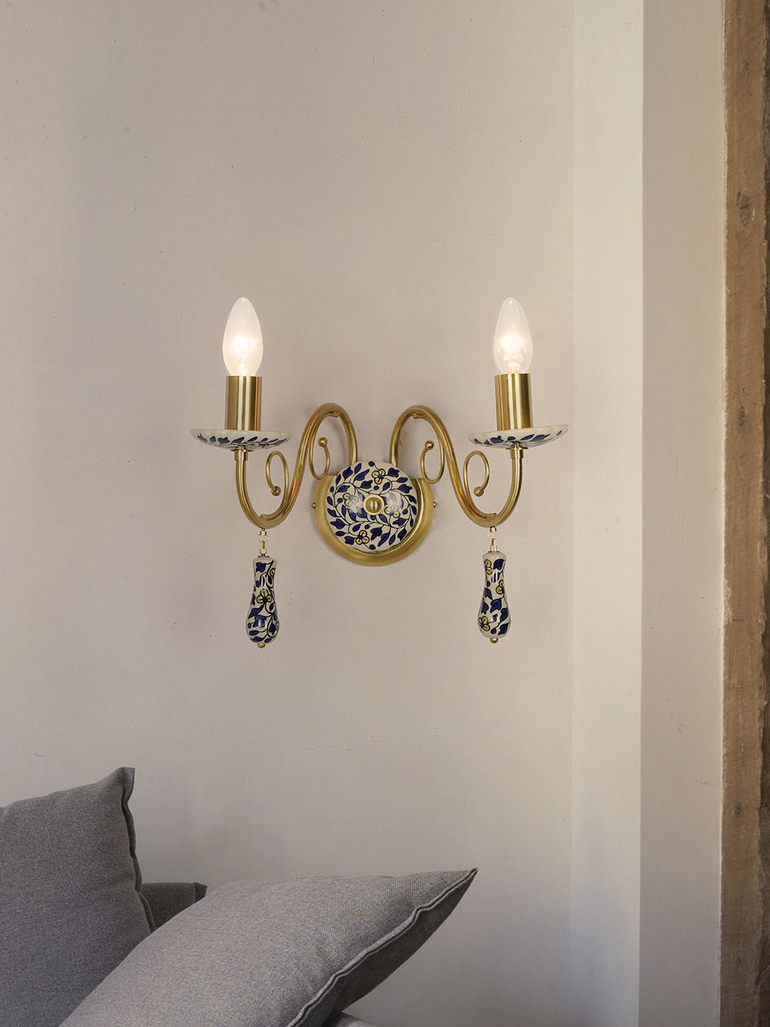 Blue Pottery Elegance: Handcrafted Floral Wall Sconce