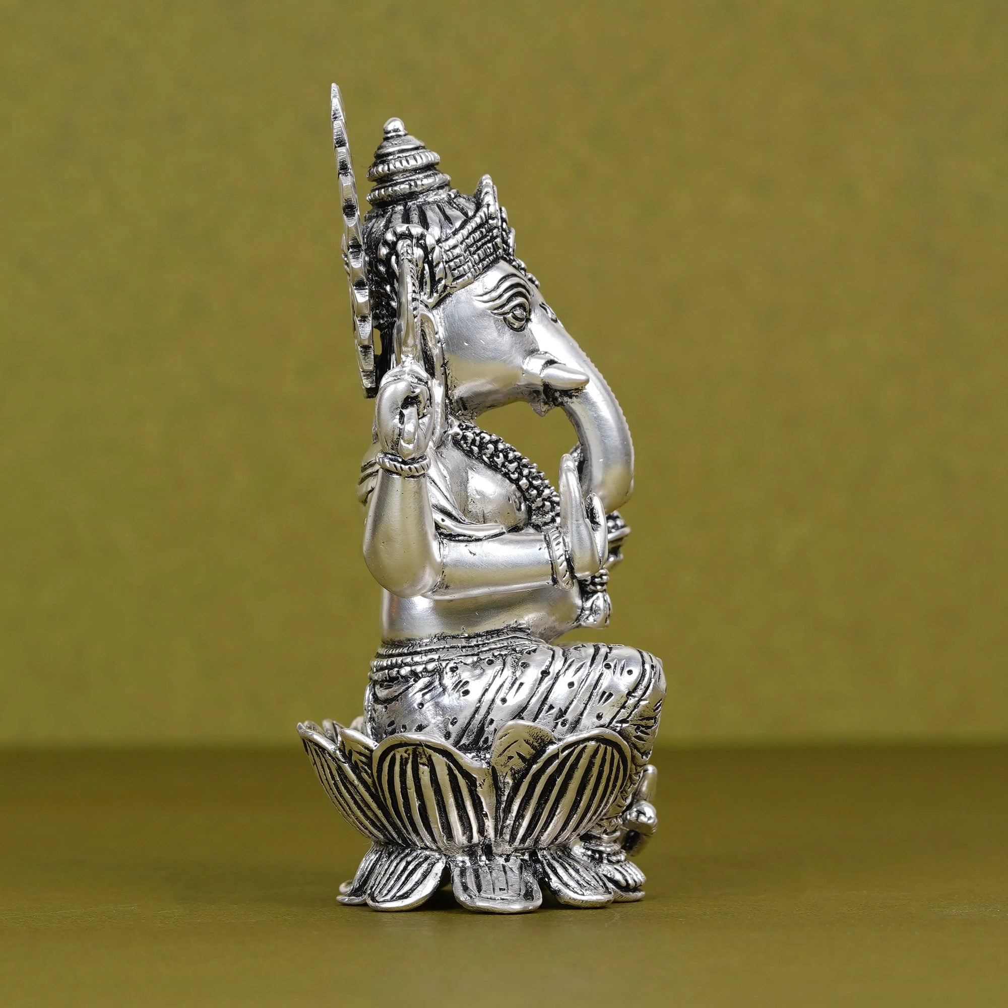 Silver plated Ganesh idol on lotus with intricate details, Sabera home decor