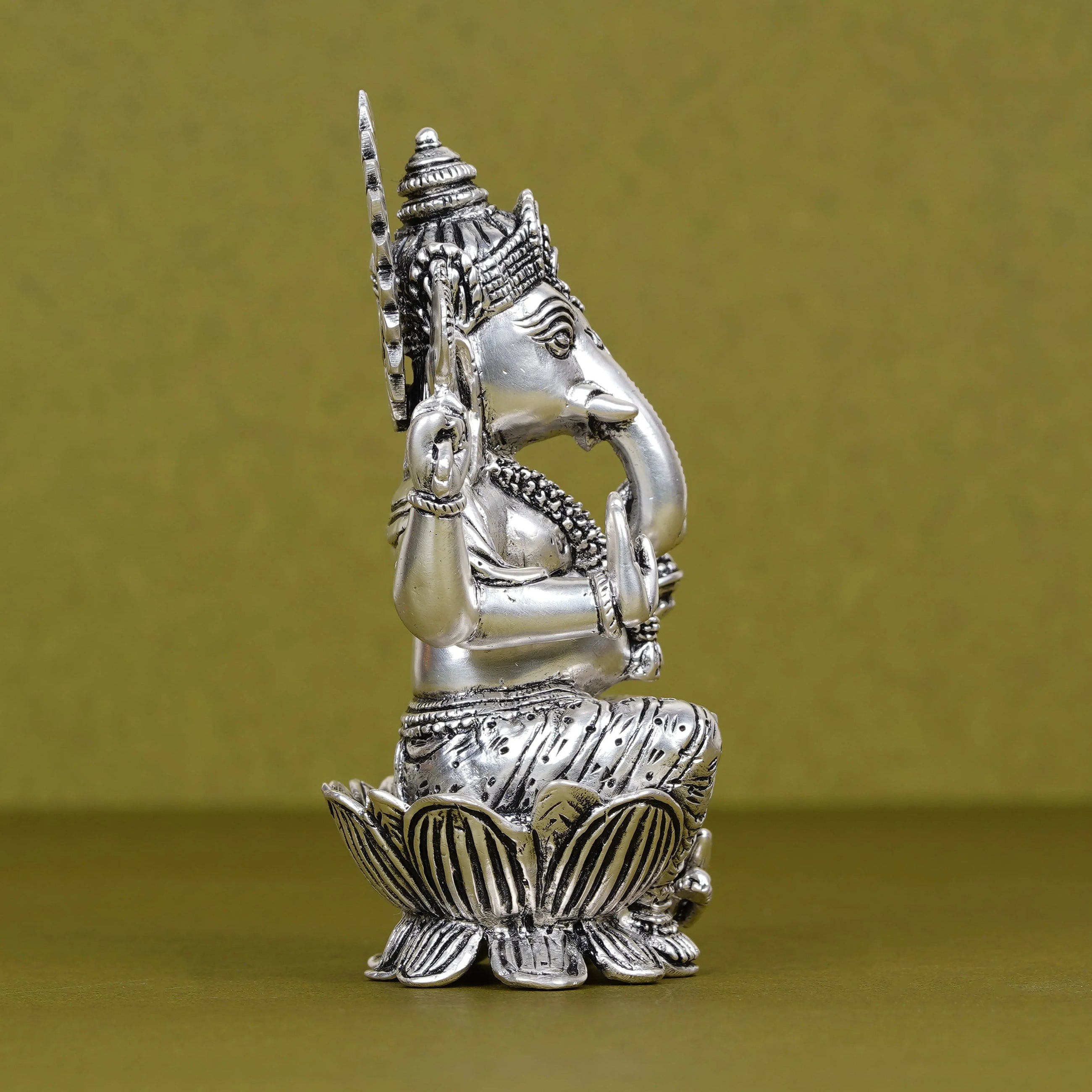 Silver plated Ganesh idol on lotus with intricate details, Sabera home decor
