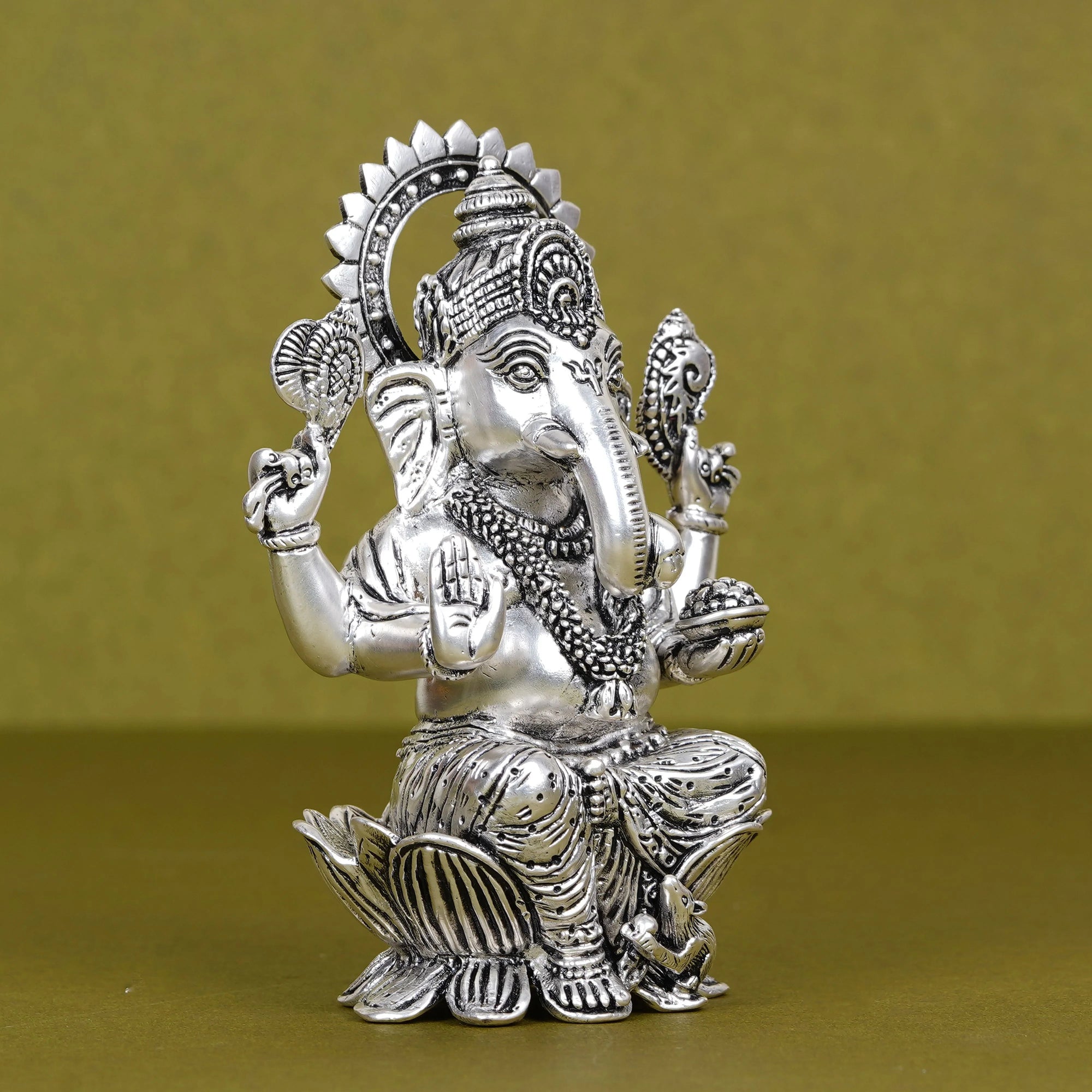Silver plated Ganesh idol on lotus with intricate details, Sabera home decor