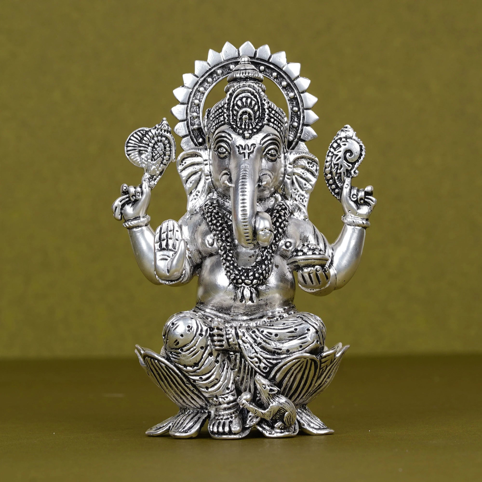 Silver plated Ganesh idol seated on lotus, detailed design, Sabera home decor