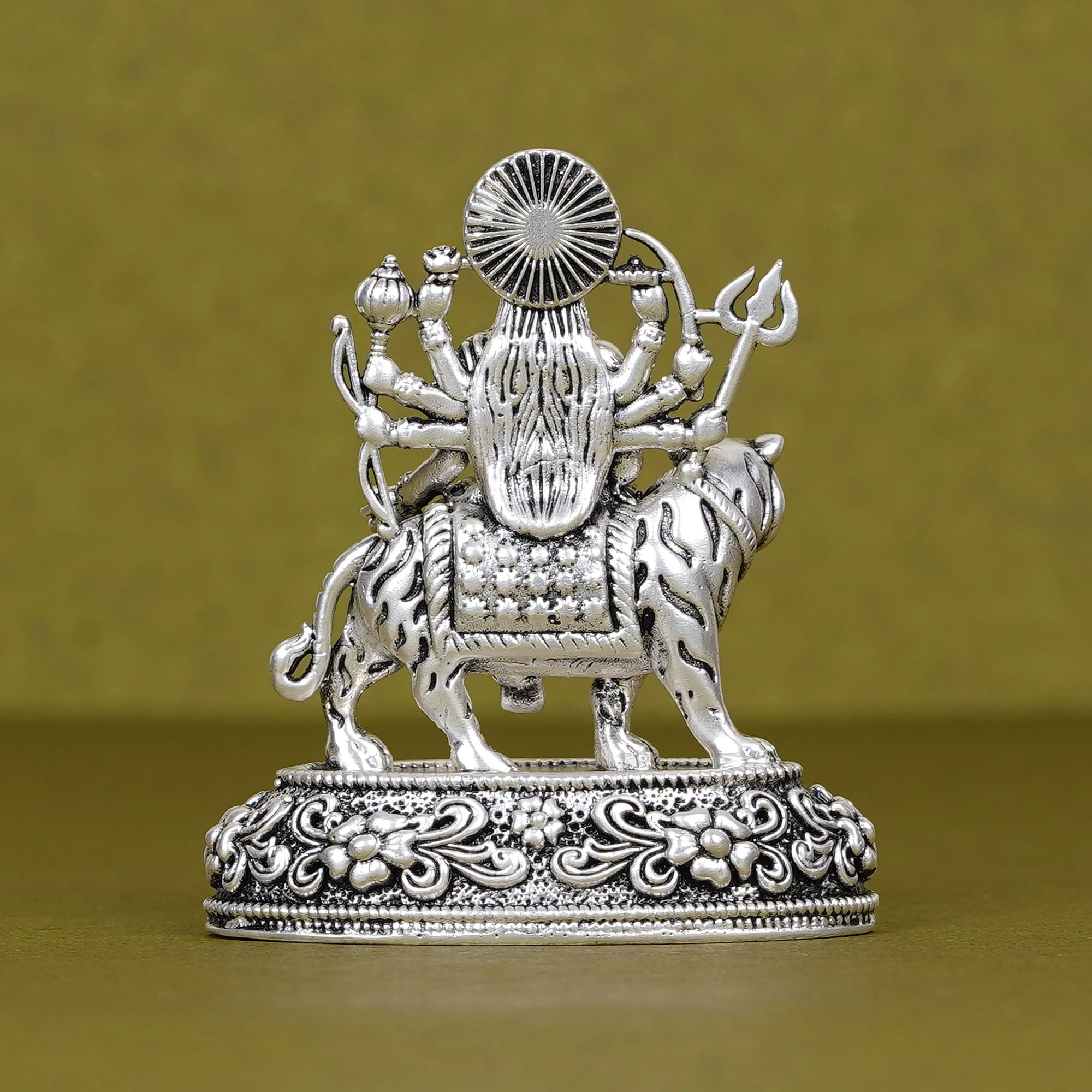 Silver Durga idol on tiger, detailed car dashboard decor, Sabera product