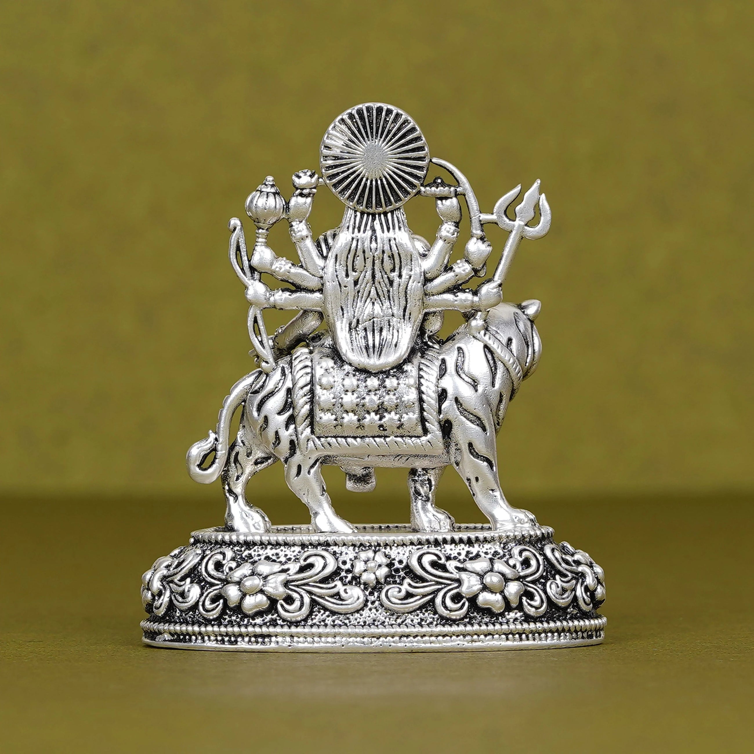 Silver Durga idol on tiger, detailed car dashboard decor, Sabera product