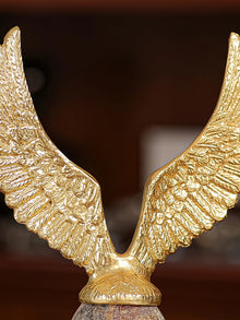 Golden Fyling Egg Sculpture