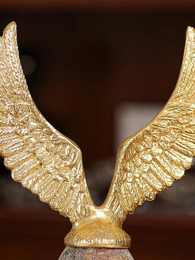 Golden Fyling Egg Sculpture