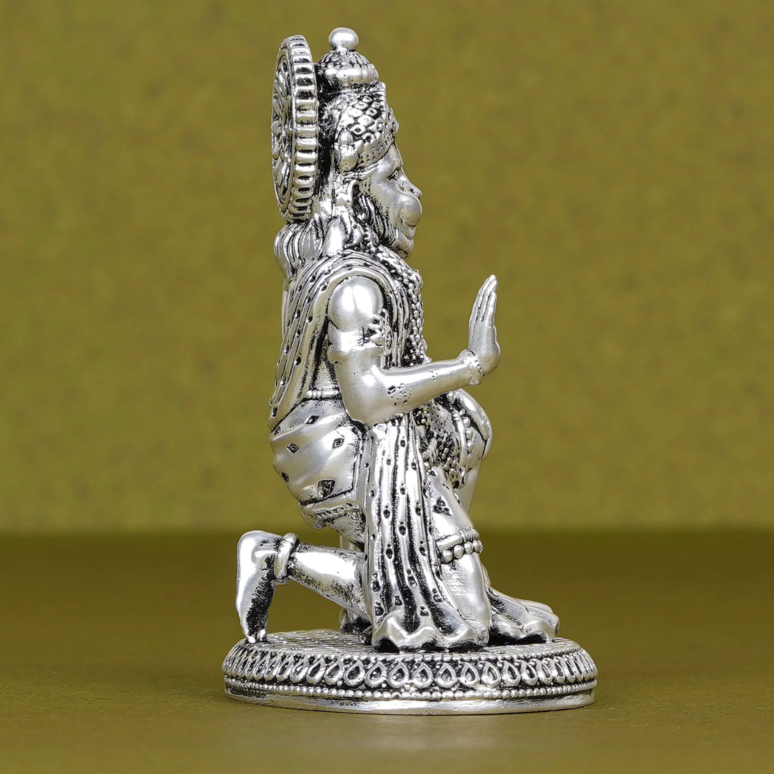 Silver Hanuman Ji idol for car dashboard on golden background, Sabera home decor
