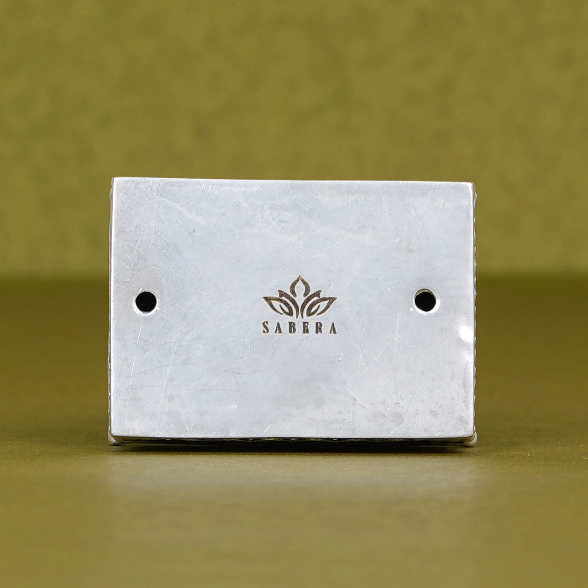 Sabera metal idol base with engraved logo, suitable for car dashboard decor