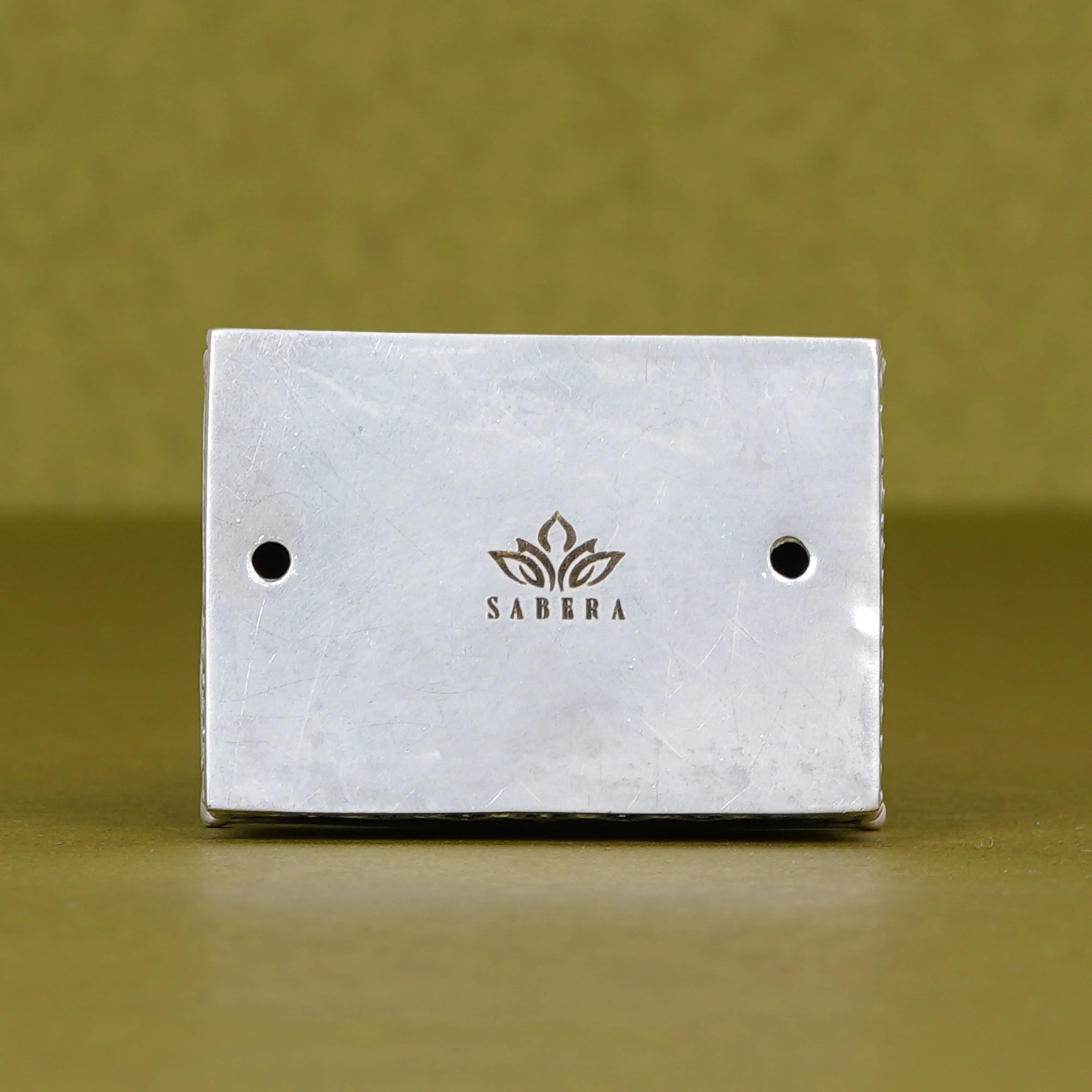 Sabera metal idol base with engraved logo, suitable for car dashboard decor