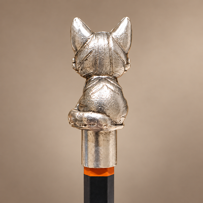 Back of the Meow kitten pencil topper showing the ears and curled tail