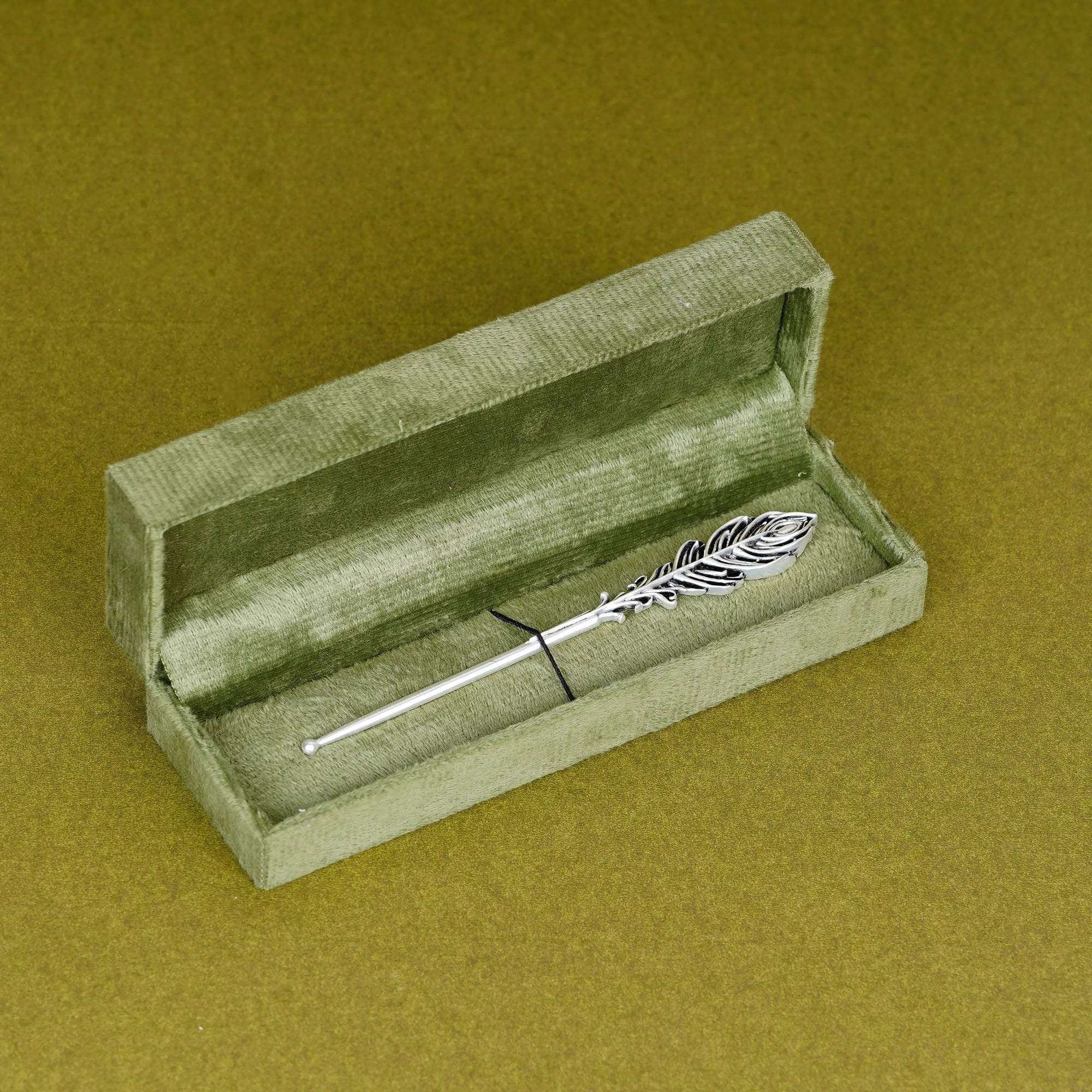 Silver peacock feather Tilak stick in green velvet box, traditional Sabera product