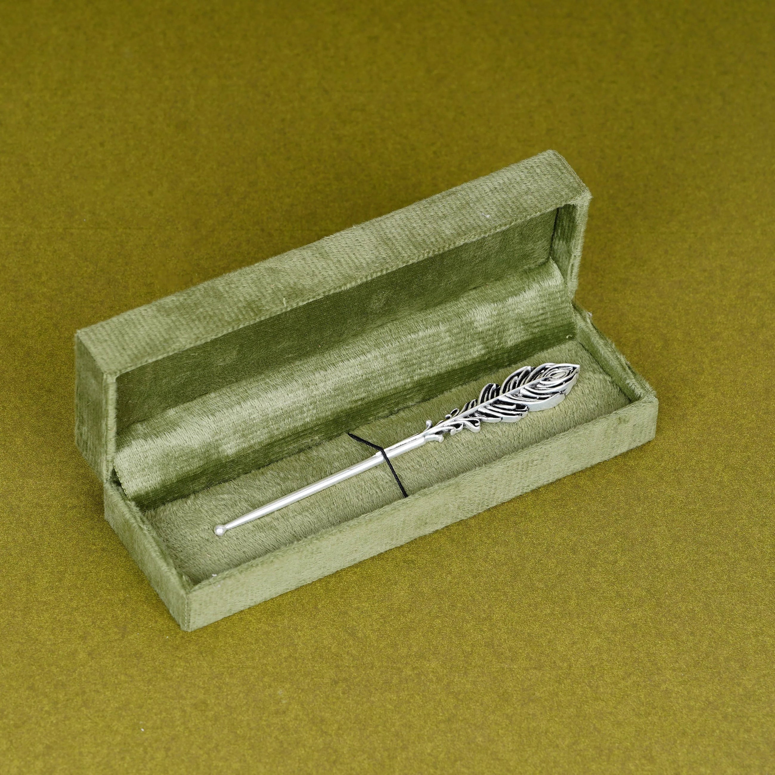 Silver peacock feather Tilak stick in green velvet box, traditional Sabera product