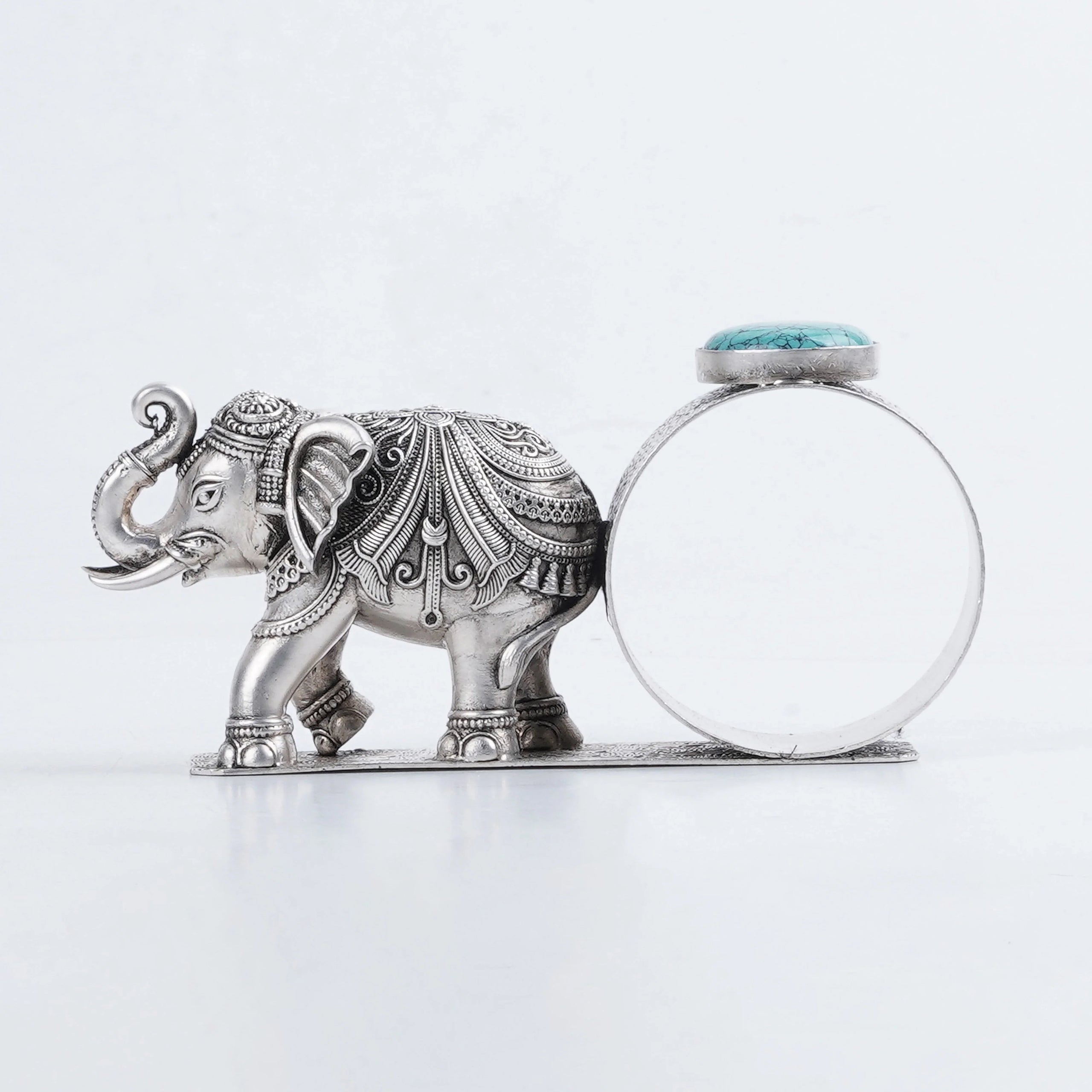 Sabera antique silver elephant napkin ring with ornate design and blue stone accent
