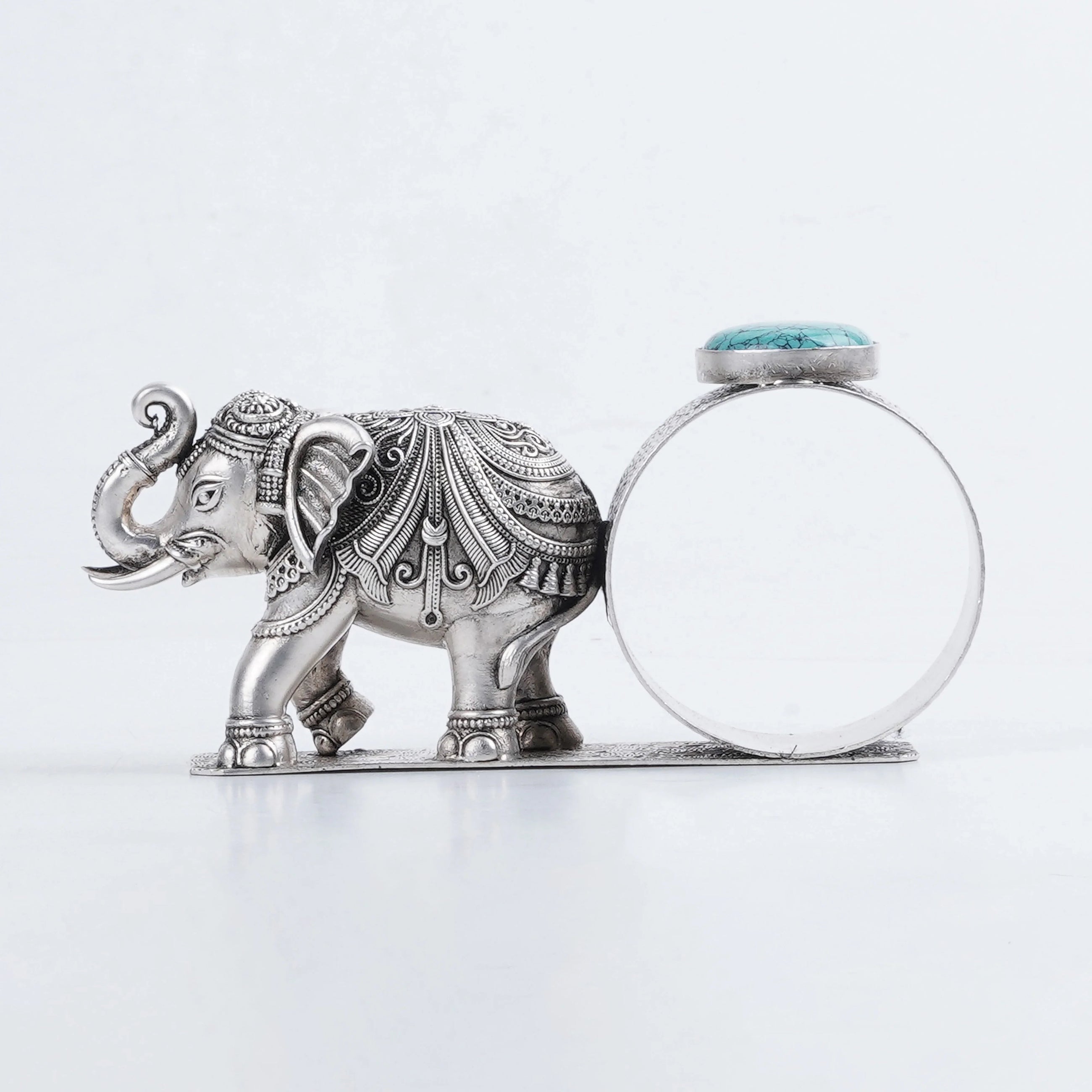 Sabera antique silver elephant napkin ring with ornate design and blue stone accent