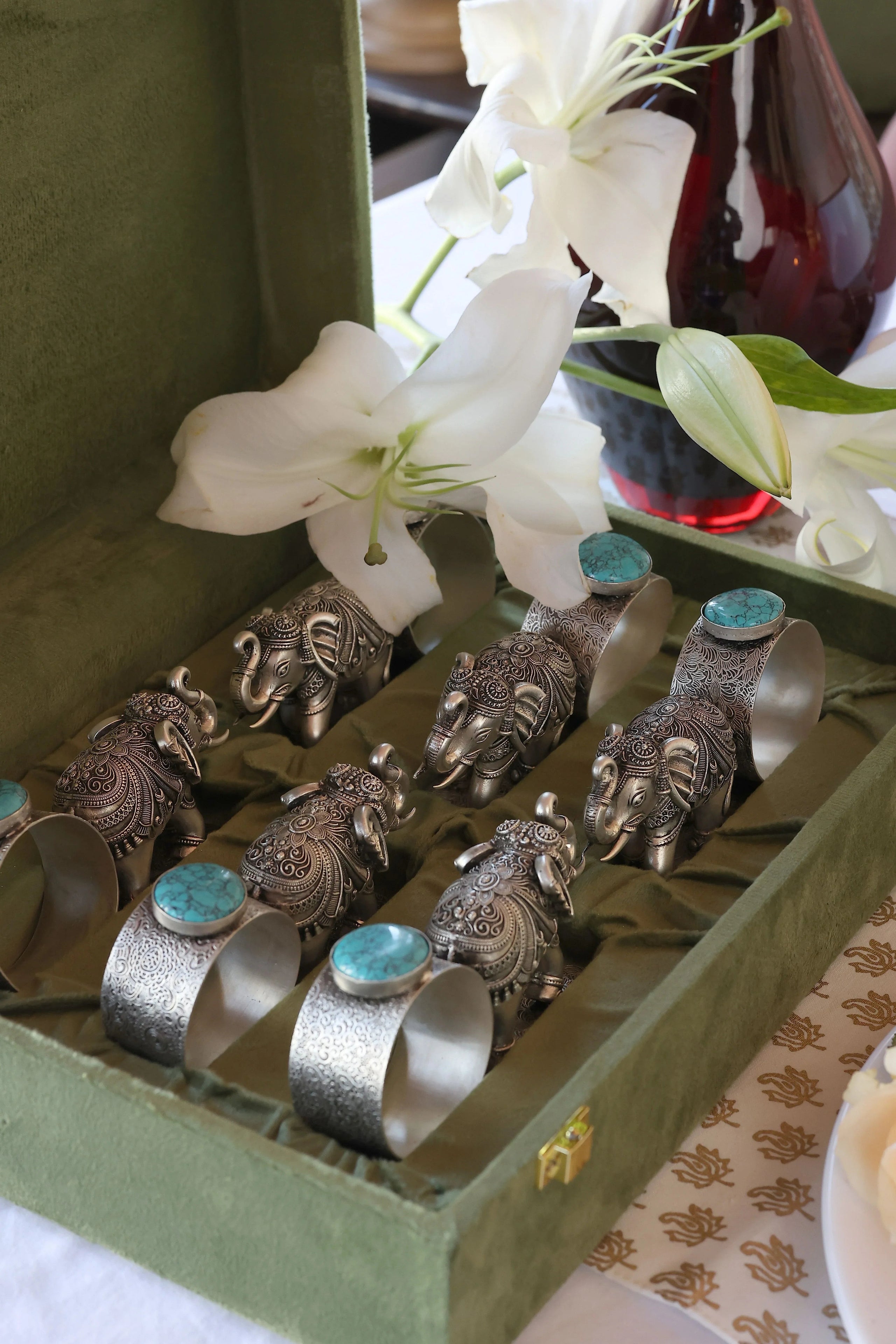 Sabera antique silver elephant napkin rings with turquoise stone in a velvet box