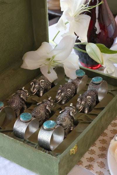 Sabera antique silver elephant napkin rings with turquoise stone in a velvet box